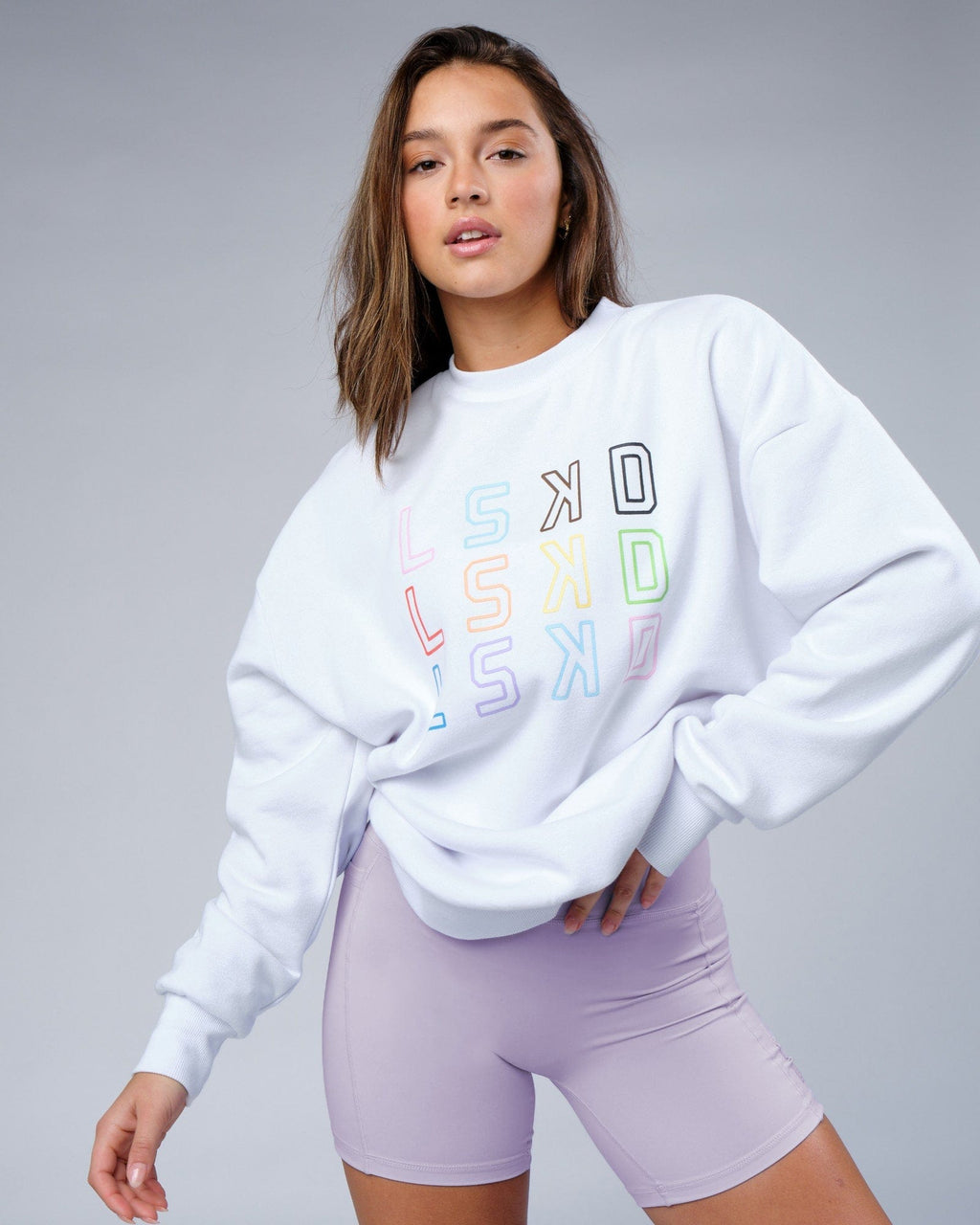 Model wearing Unisex Progress Sweater Oversize - White