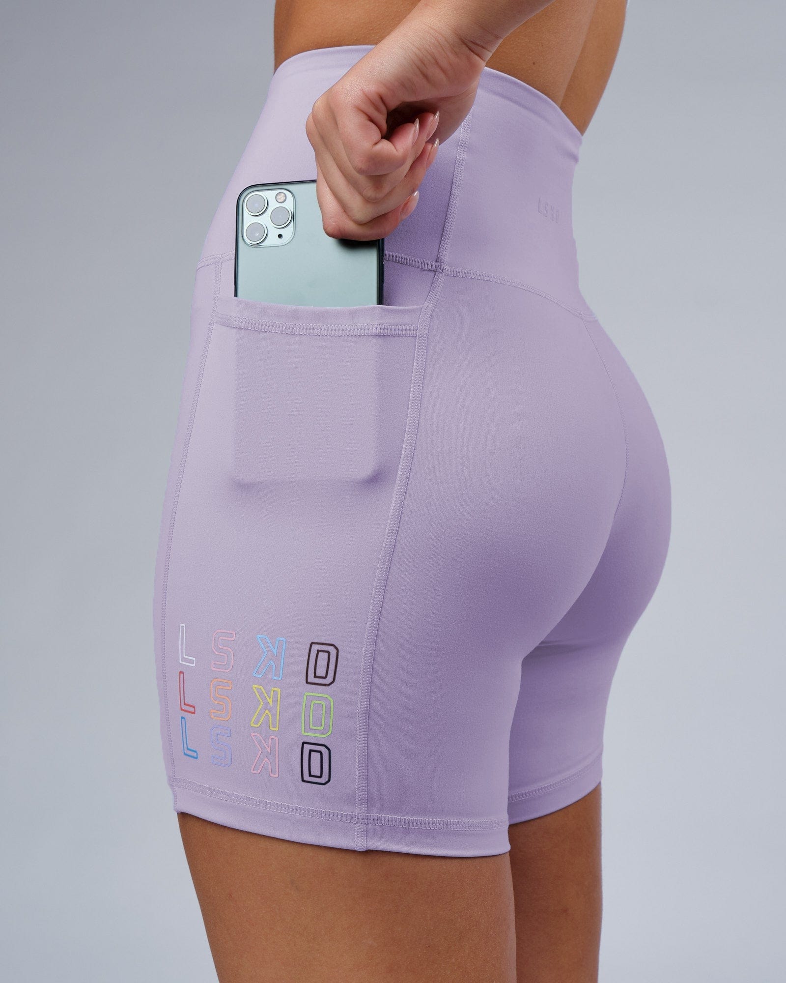 Model wearing Progress Recycled Mid Short Tight - Lavender