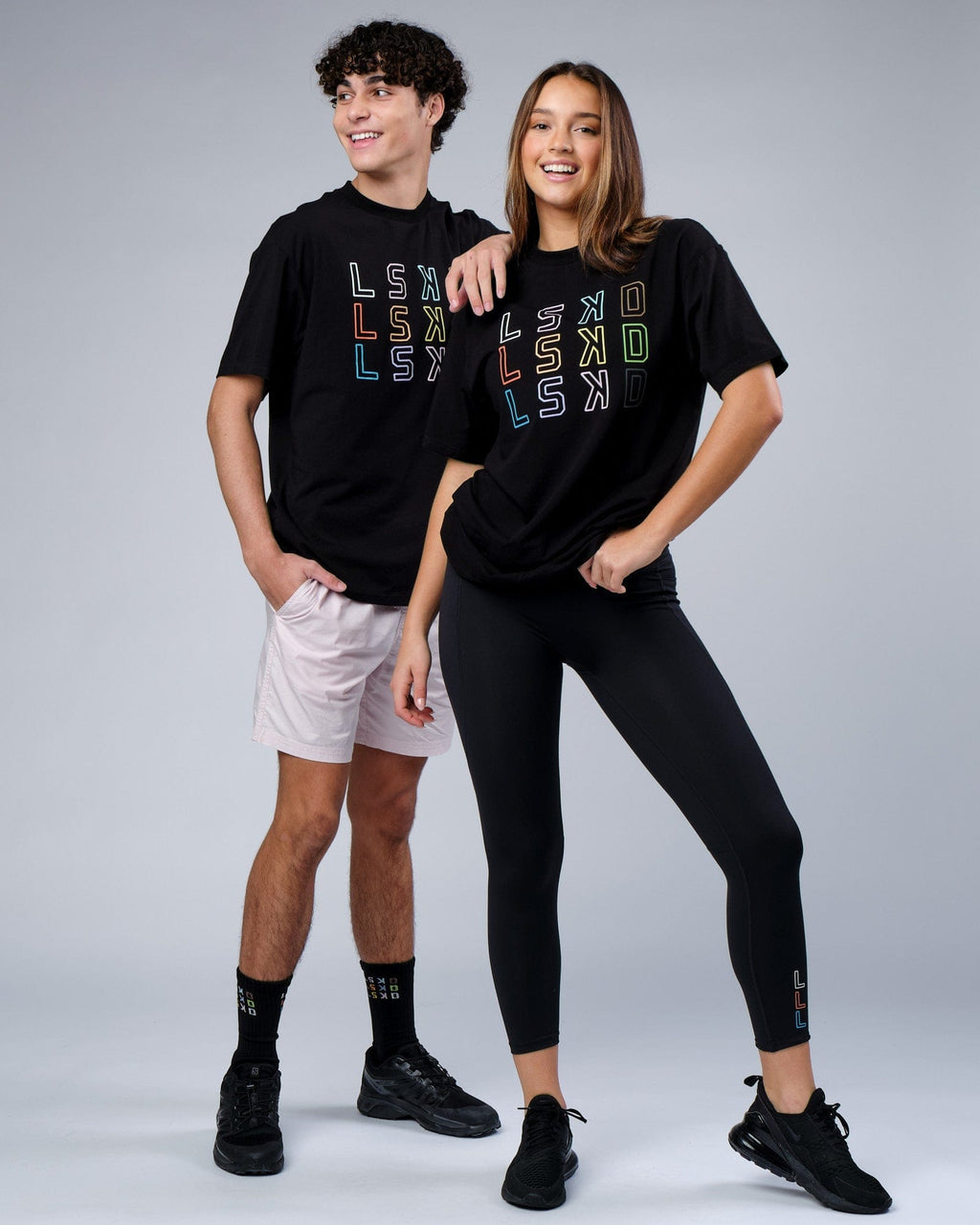 Model wearing Unisex Progress FLXCotton Tee Oversize - Black