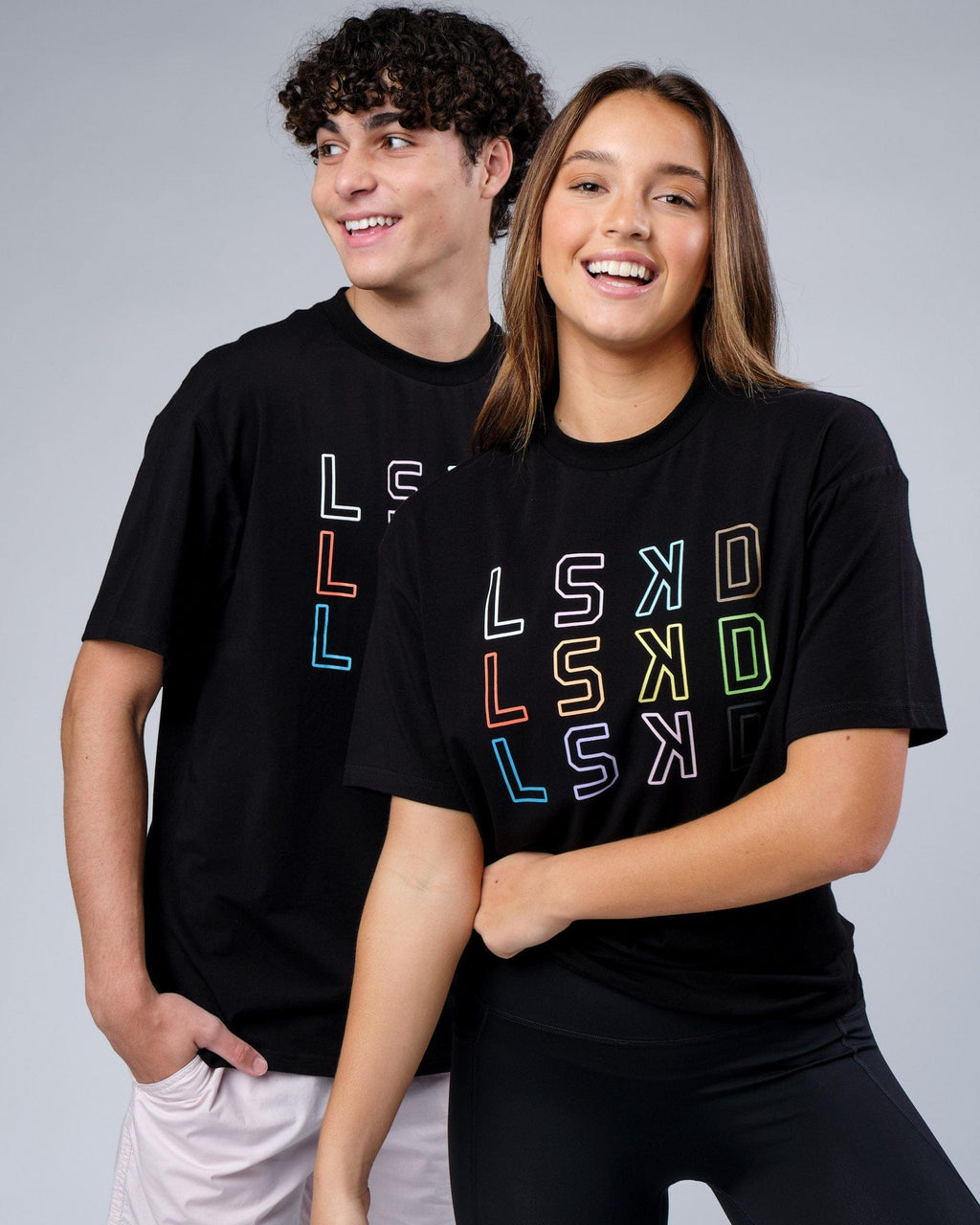 Model wearing Unisex Progress FLXCotton Tee Oversize - Black