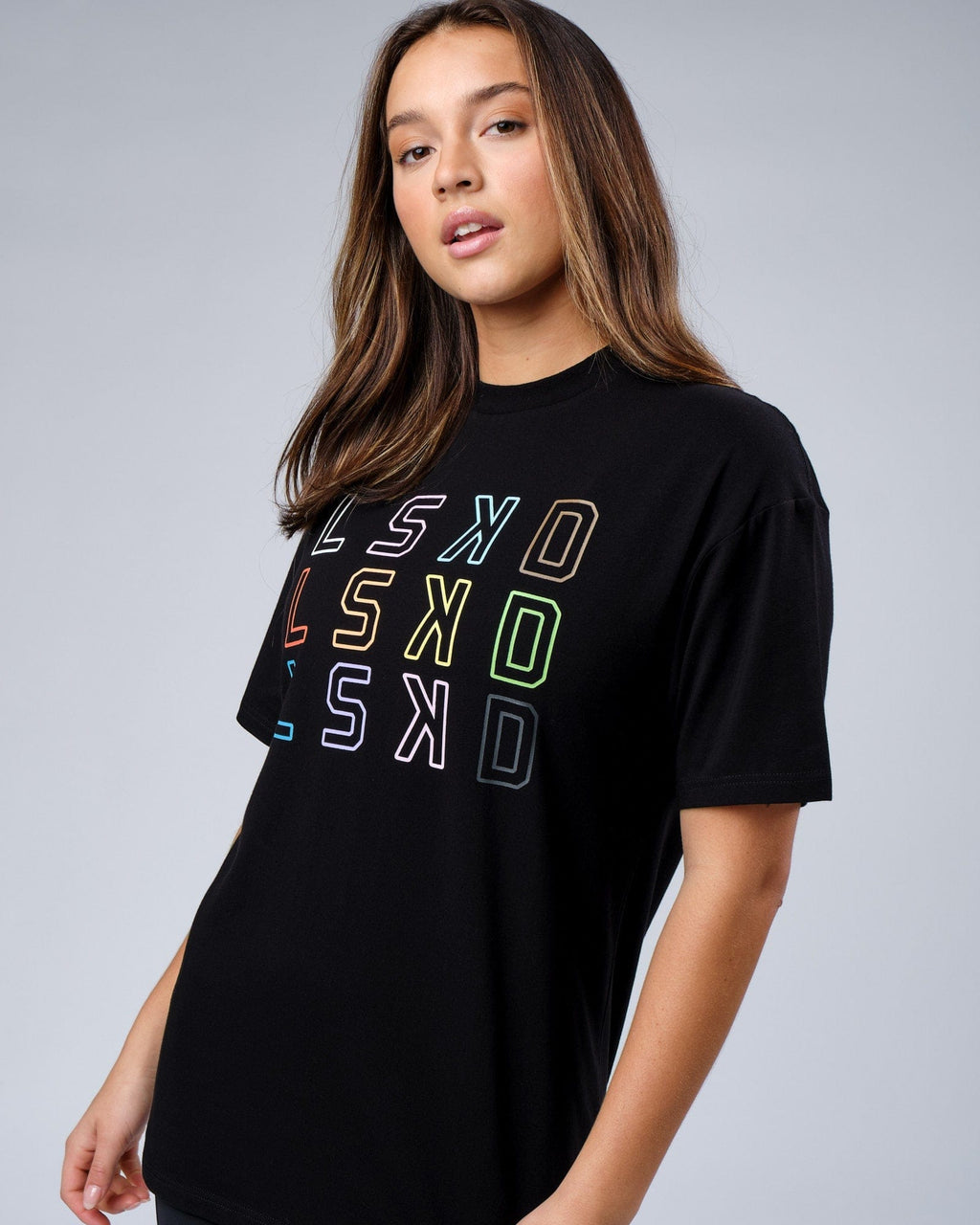 Model wearing Unisex Progress FLXCotton Tee Oversize - Black