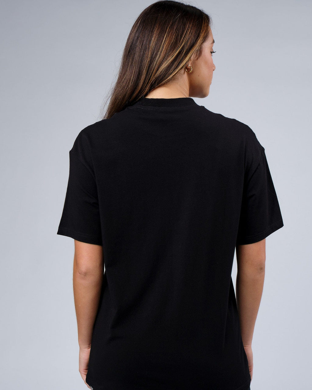 Model wearing Unisex Progress FLXCotton Tee Oversize - Black
