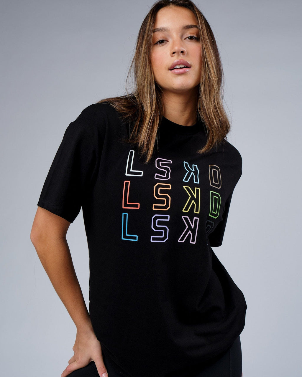 Model wearing Unisex Progress FLXCotton Tee Oversize - Black