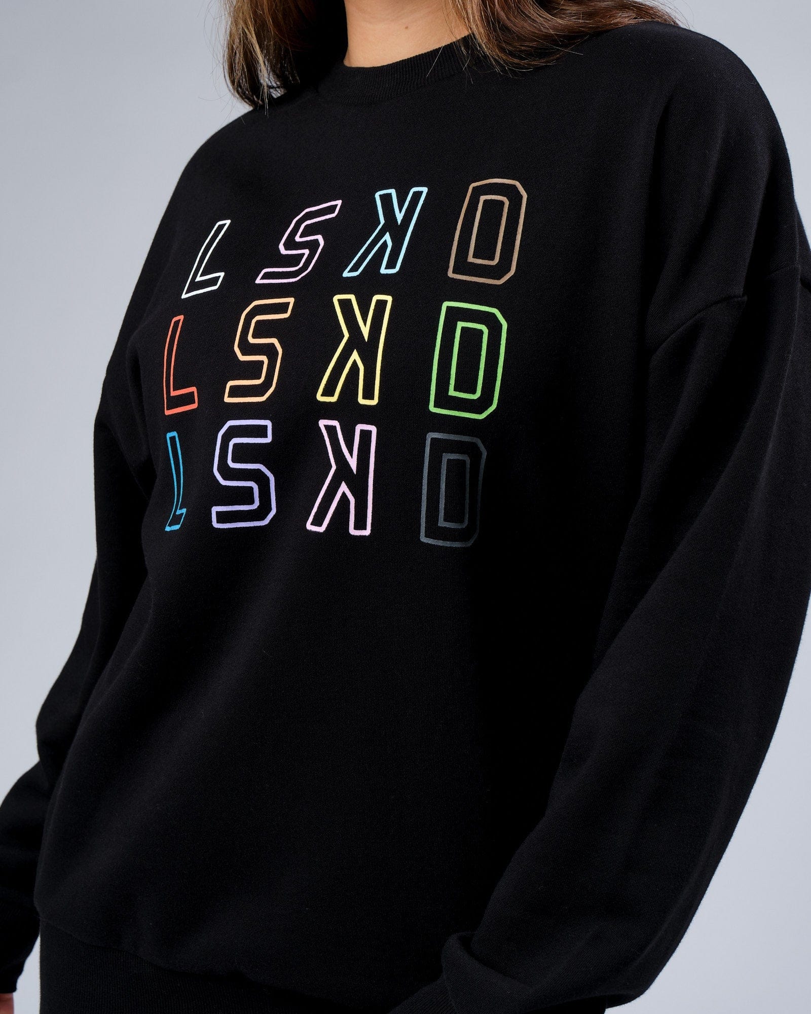 Model wearing Unisex Progress Sweater Oversize - Black