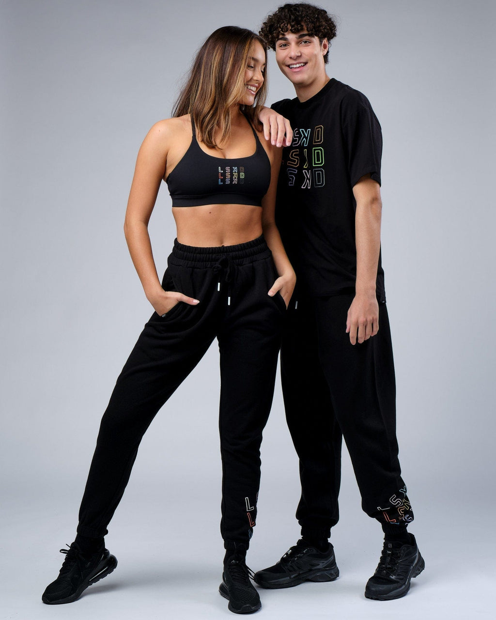 Model wearing Unisex Progress Track Pant - Black