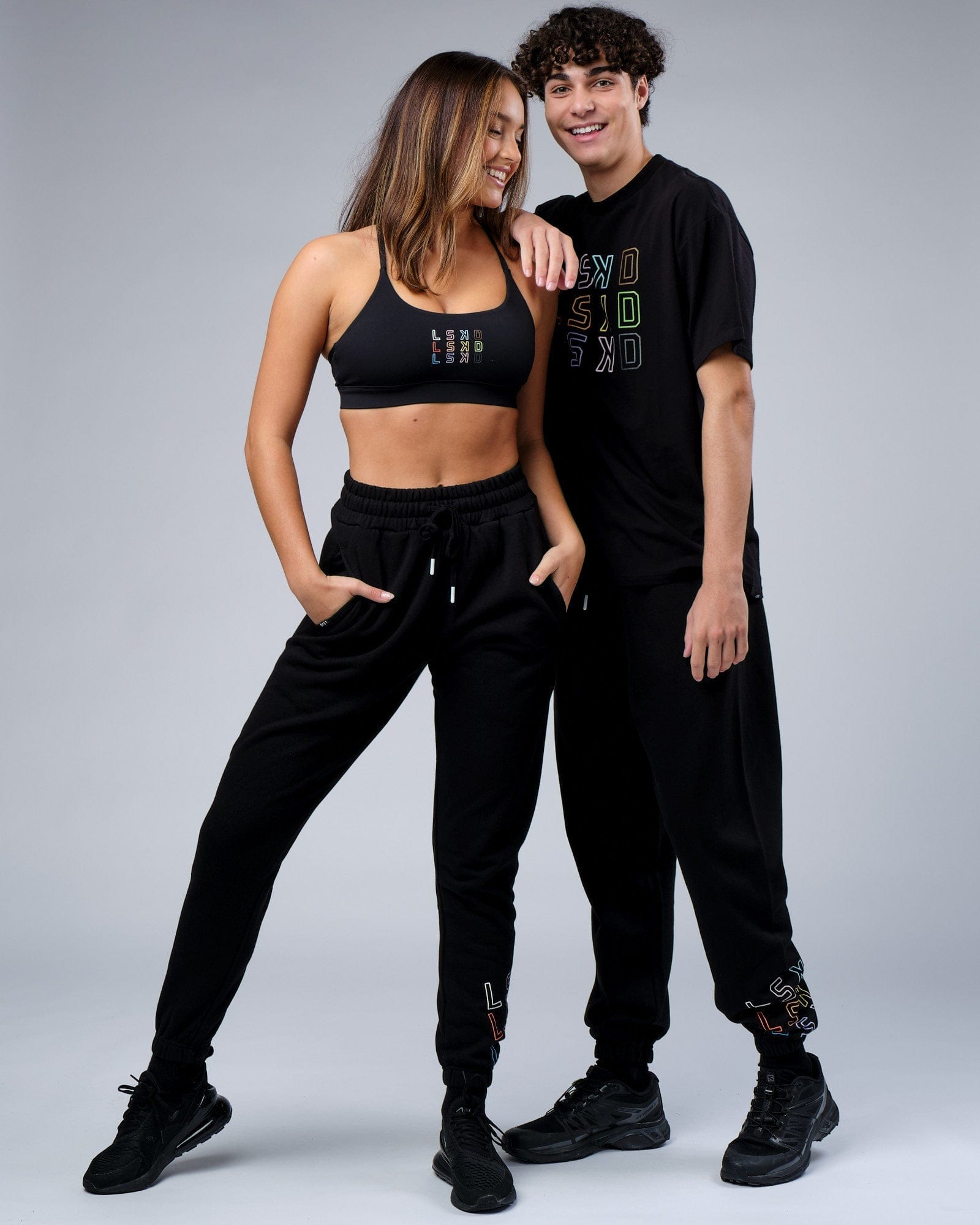 Model wearing Unisex Progress Track Pant - Black