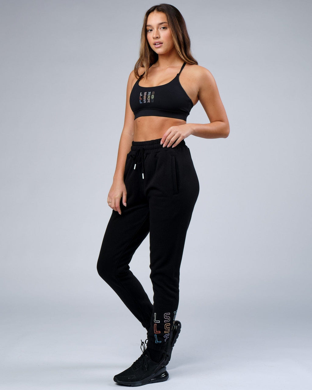 Model wearing Unisex Progress Track Pant - Black