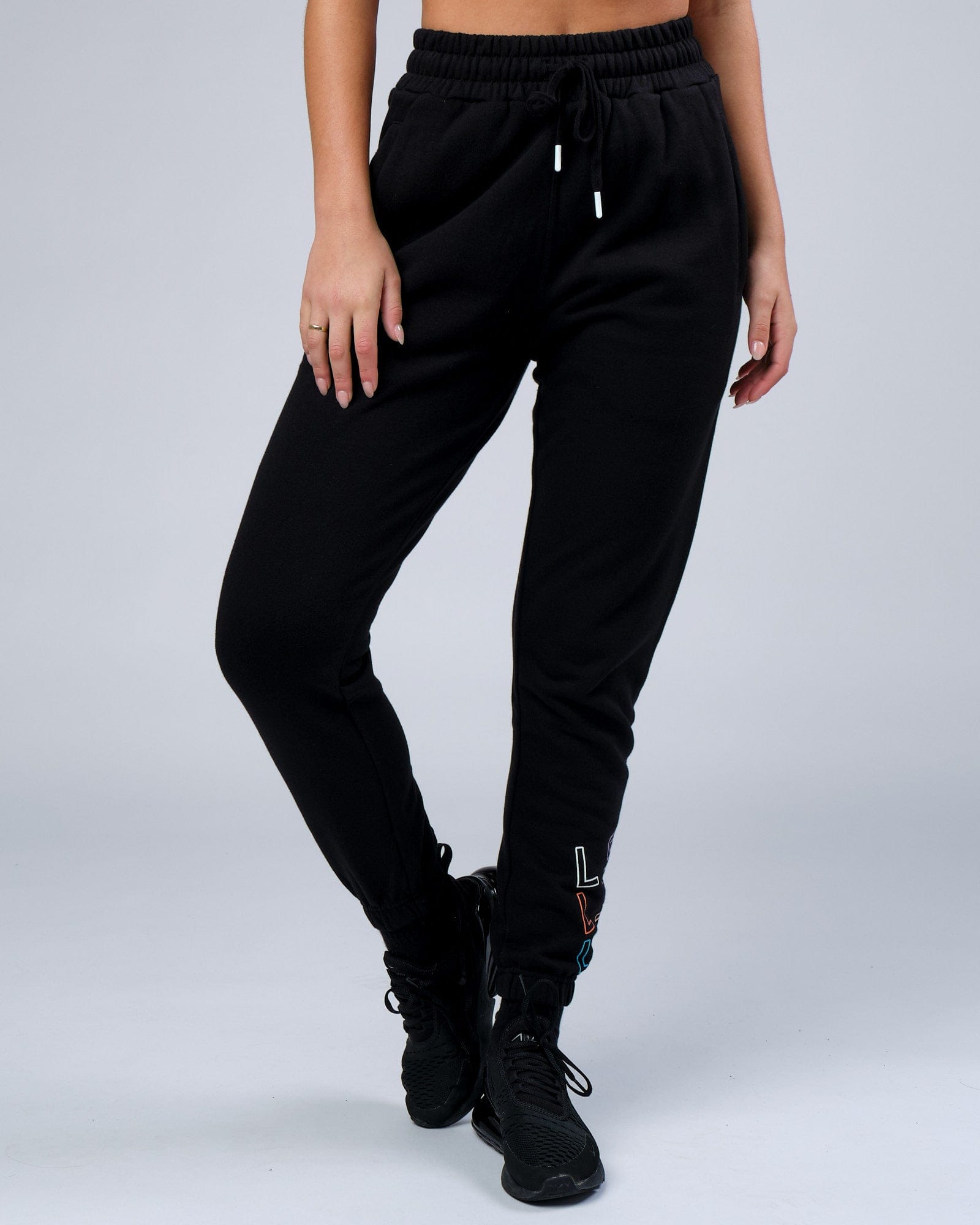 Model wearing Unisex Progress Track Pant - Black