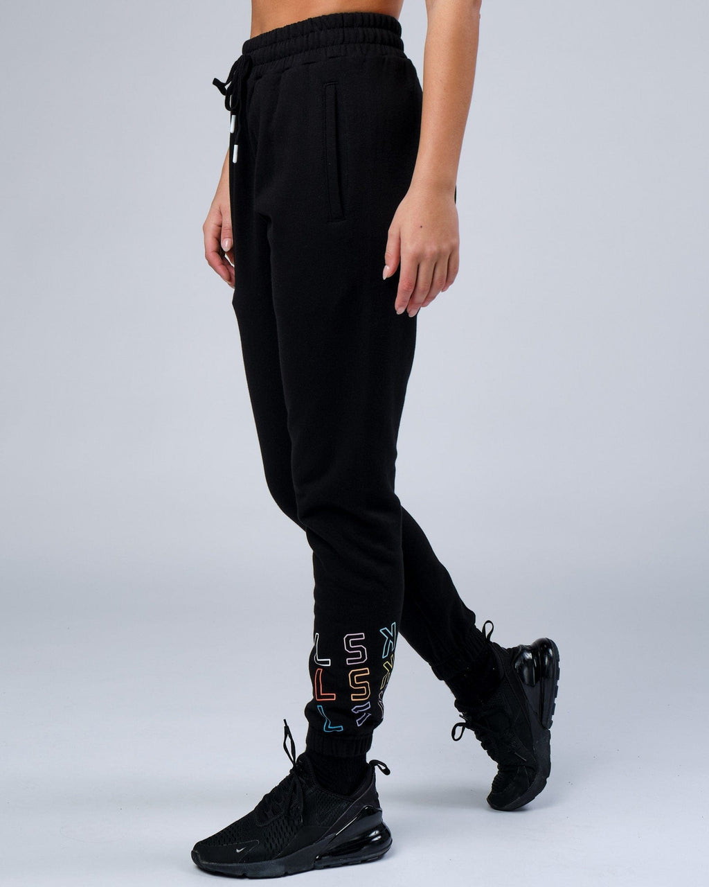 Model wearing Unisex Progress Track Pant - Black