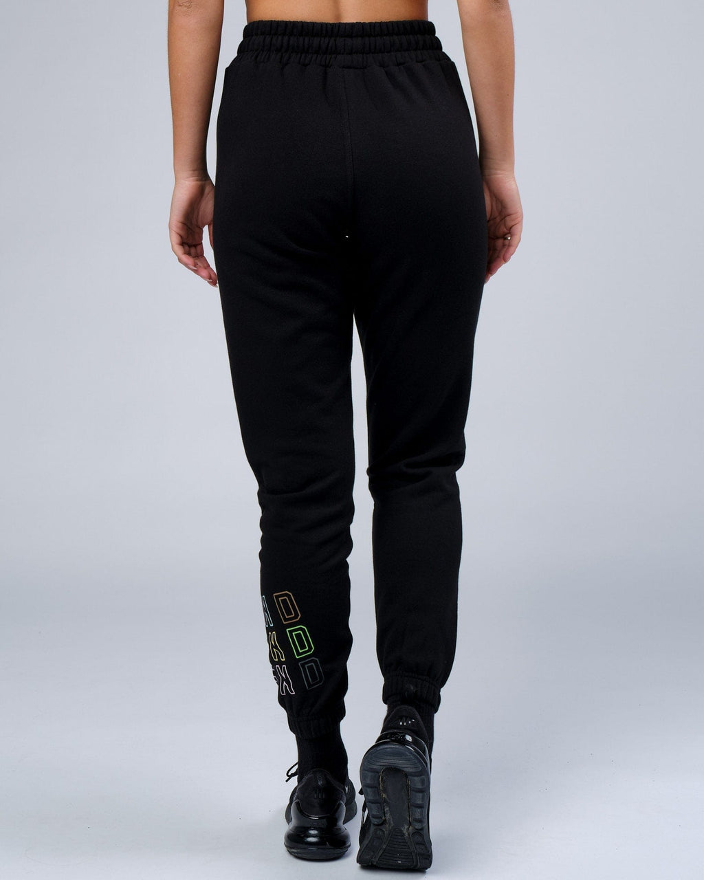 Model wearing Unisex Progress Track Pant - Black