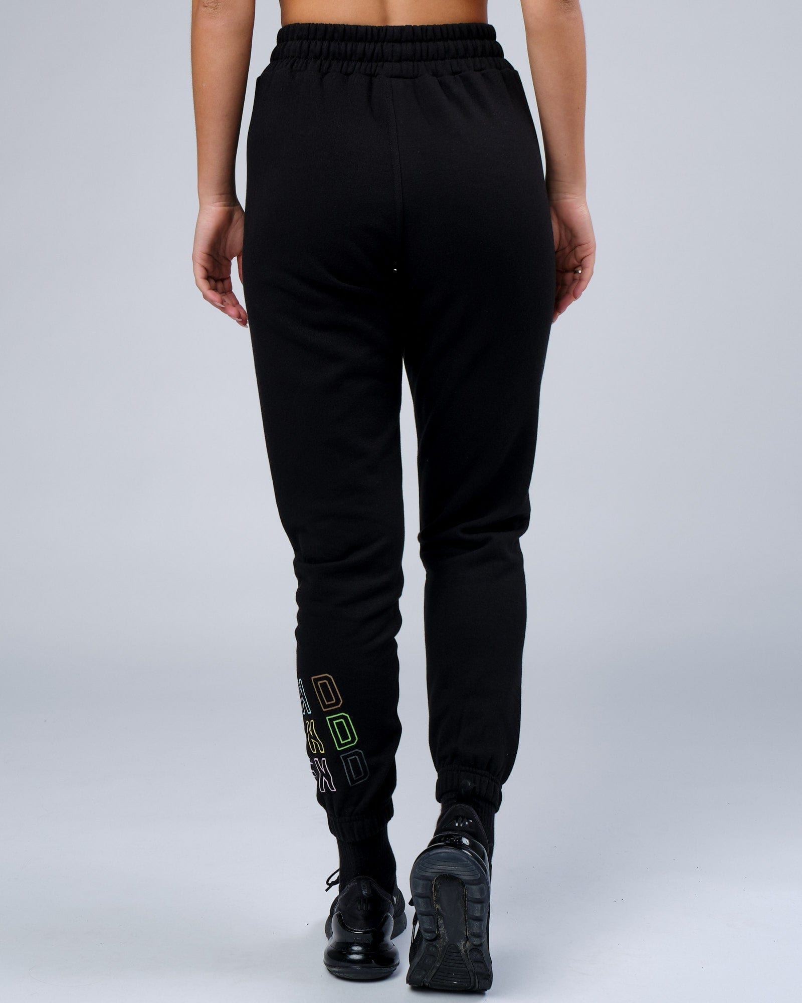 Model wearing Unisex Progress Track Pant - Black