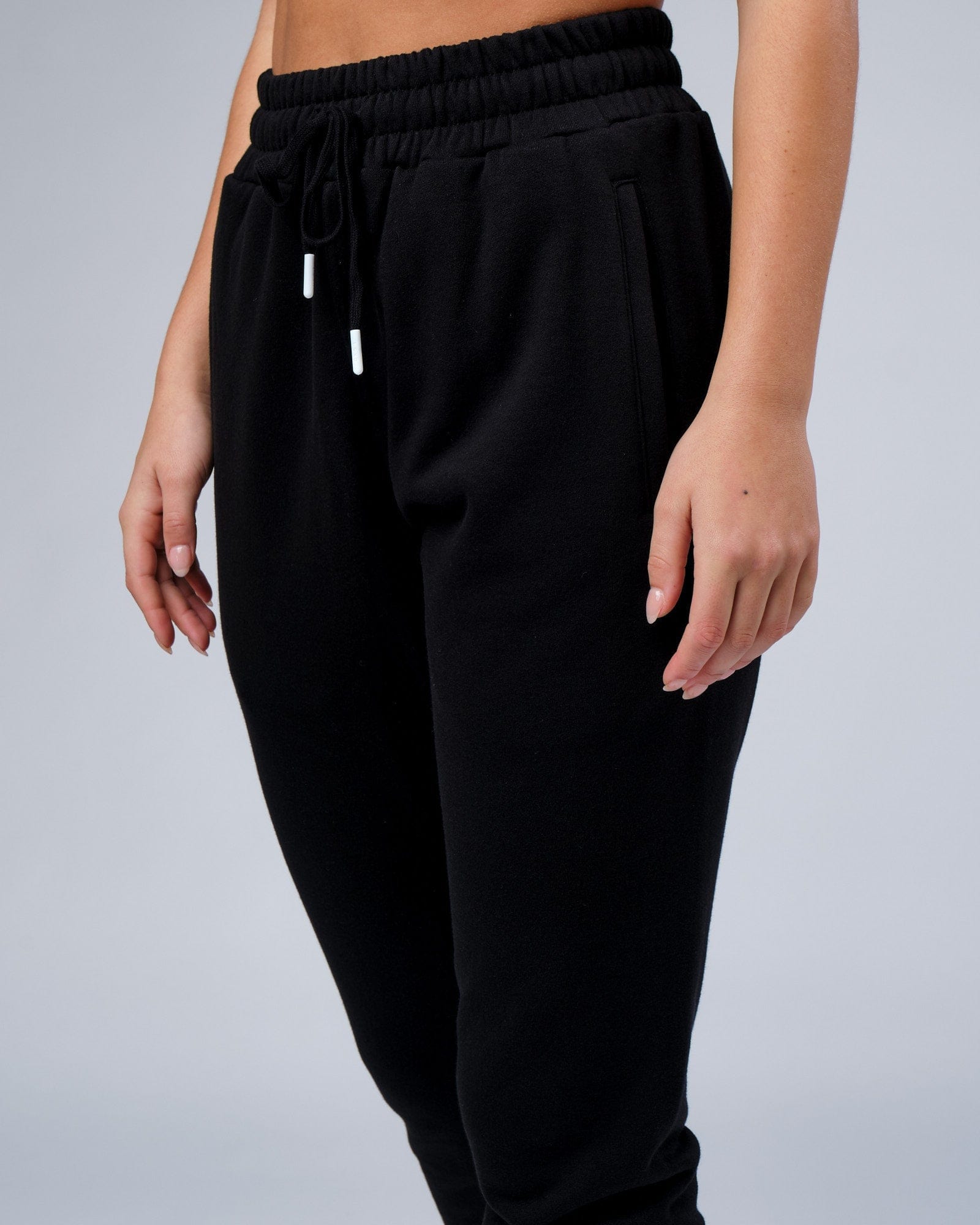 Model wearing Unisex Progress Track Pant - Black