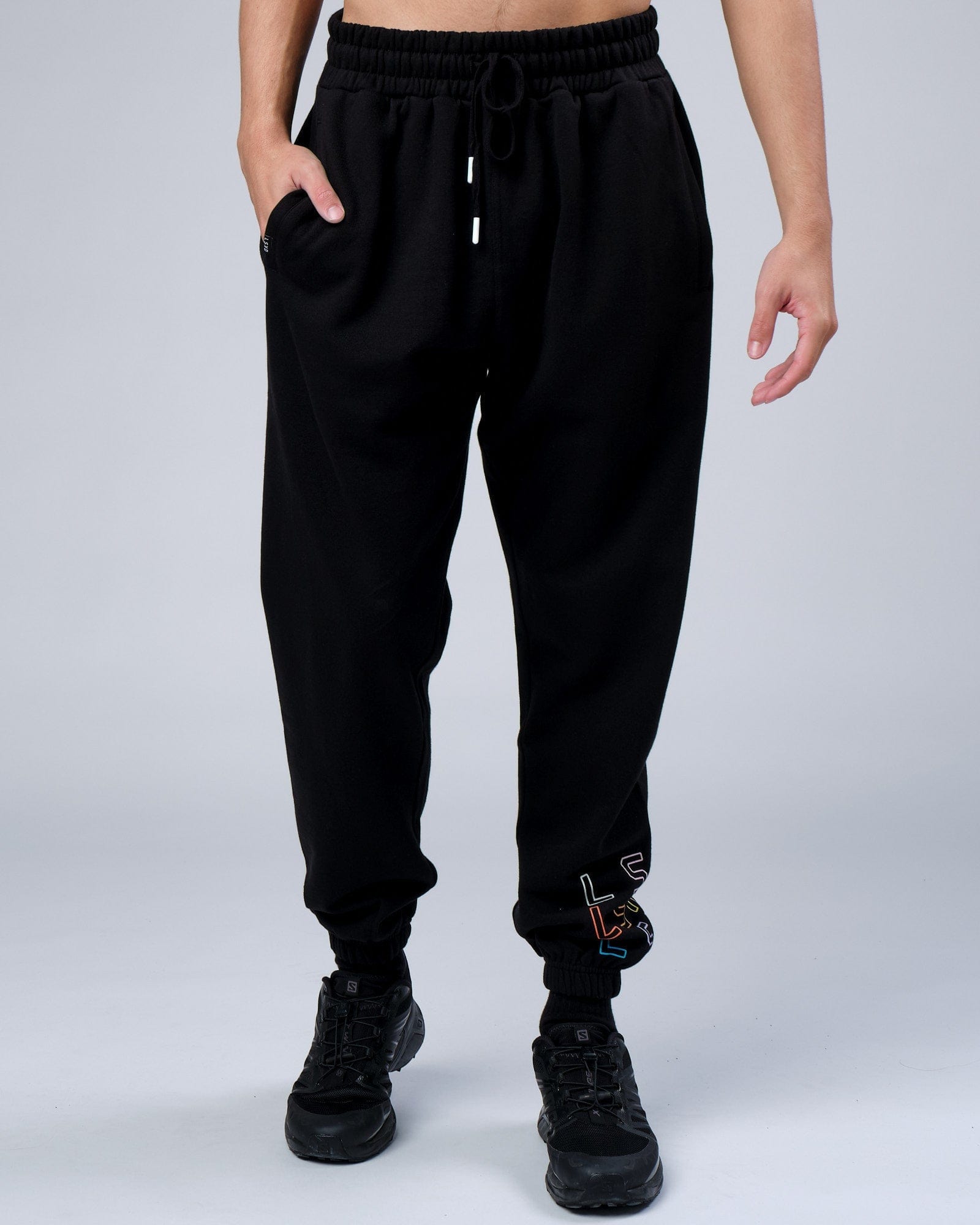 Model wearing Progress Track Pant - Black