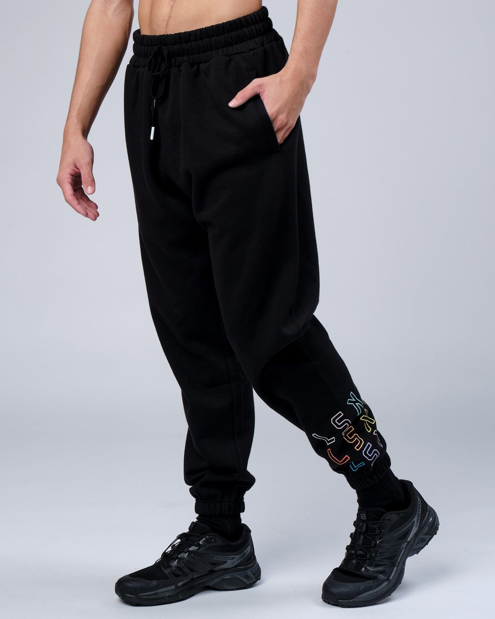 Model wearing Progress Track Pant - Black
