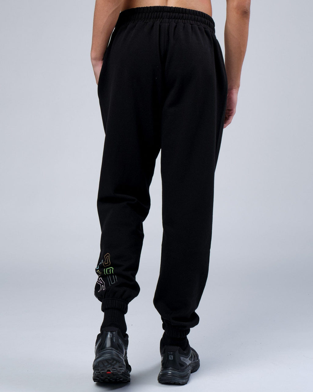 Model wearing Progress Track Pant - Black