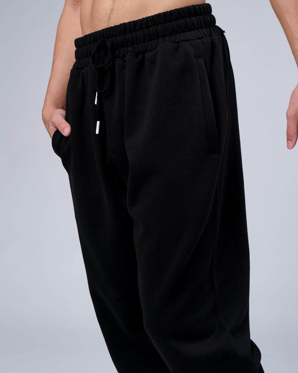 Model wearing Progress Track Pant - Black