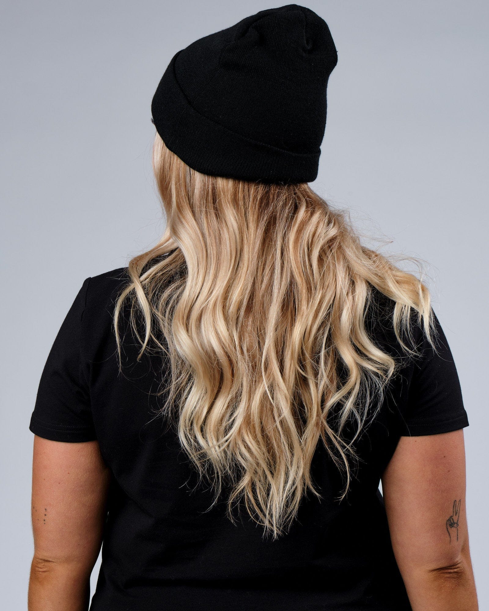 Model wearing Progress Beanie - Black