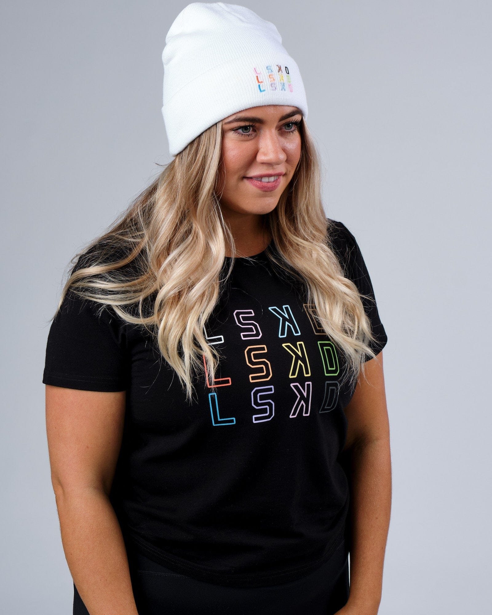 Model wearing Progress Beanie - White
