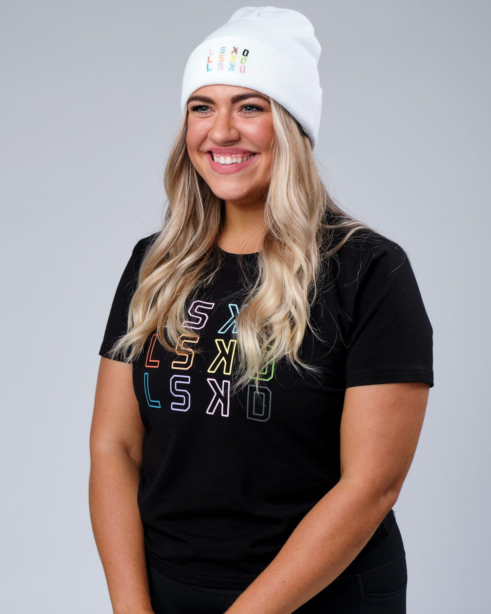 Model wearing Progress Beanie - White