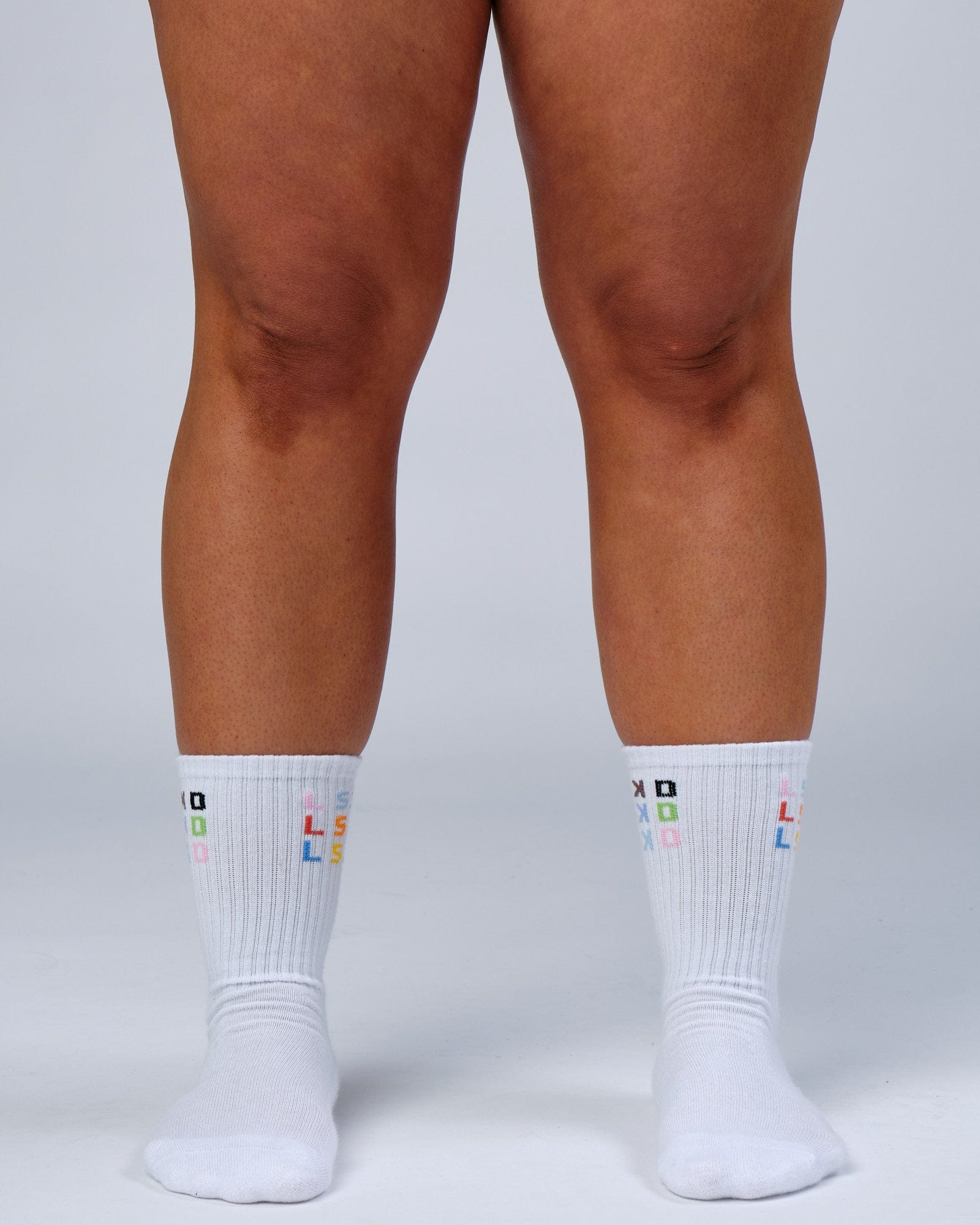 Model wearing Progress Crew Sock - White