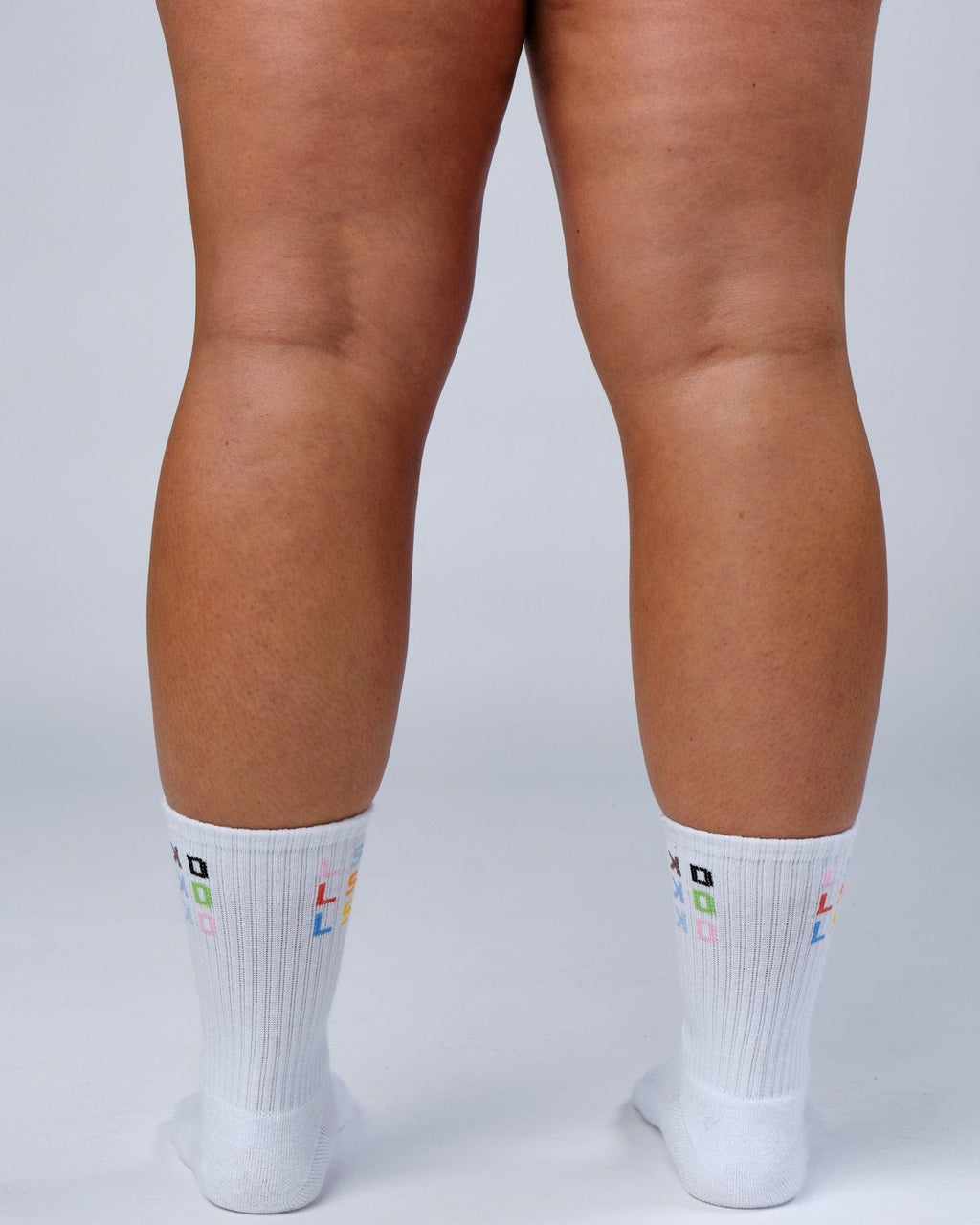 Model wearing Progress Crew Sock - White
