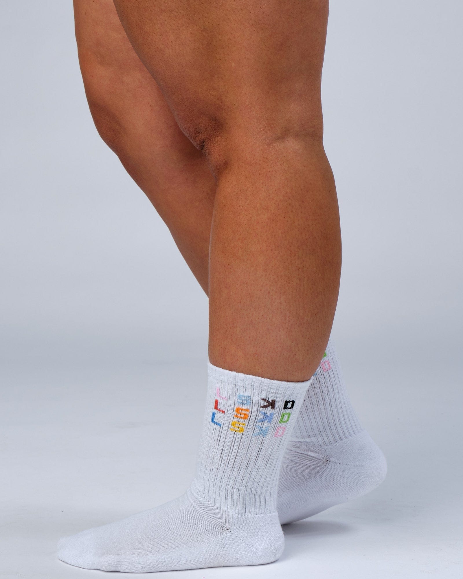 Model wearing Progress Crew Sock - White