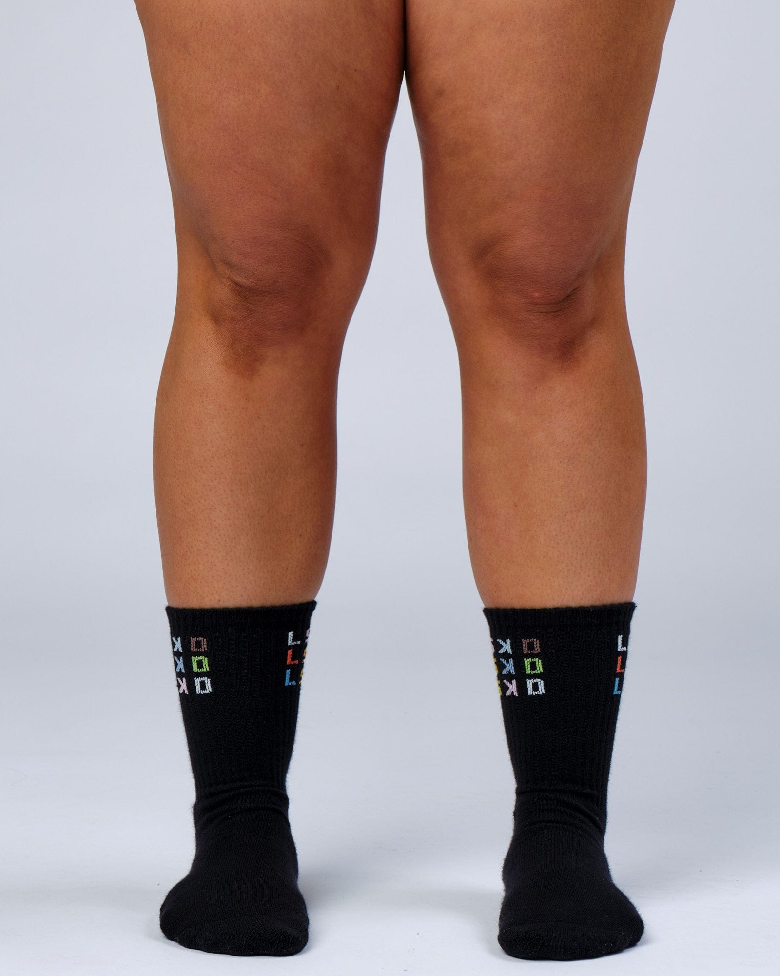 Model wearing Progress Crew Sock - Black