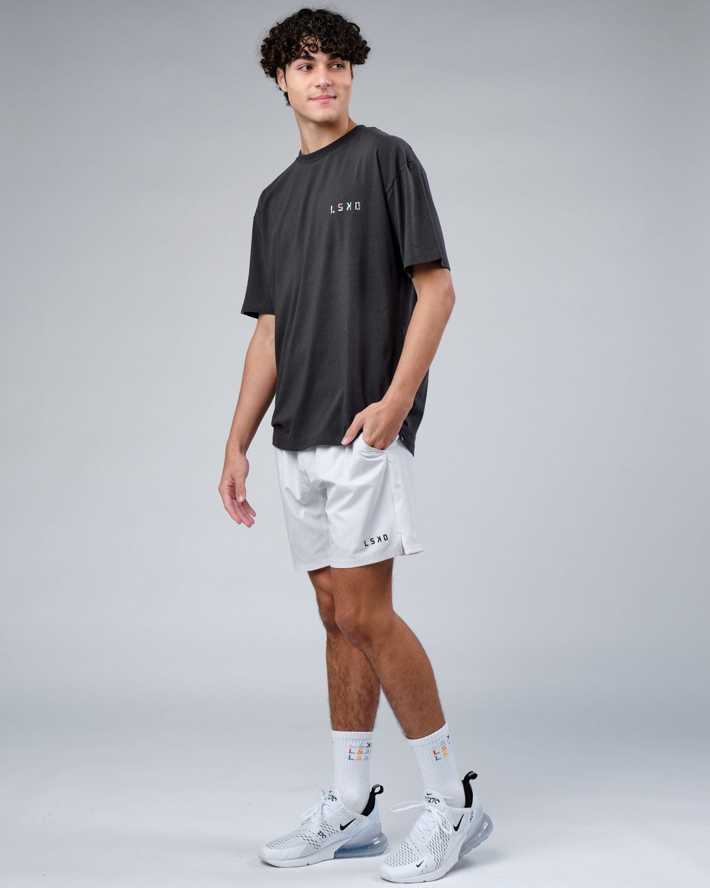 Model wearing Unity FLXCotton Tee Oversize - Pirate Black