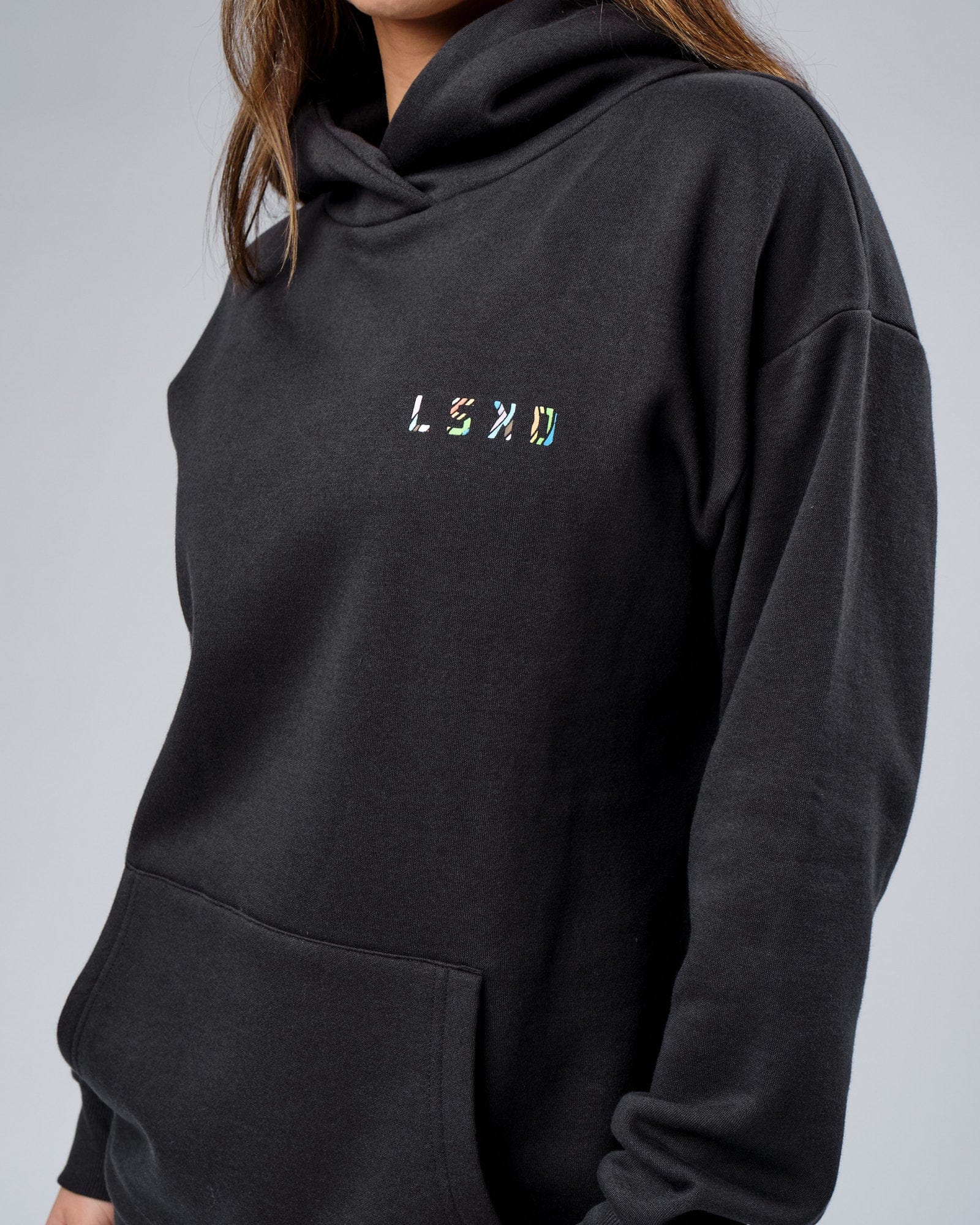 Model wearing Unisex Unity Hoodie Oversize - Pirate Black