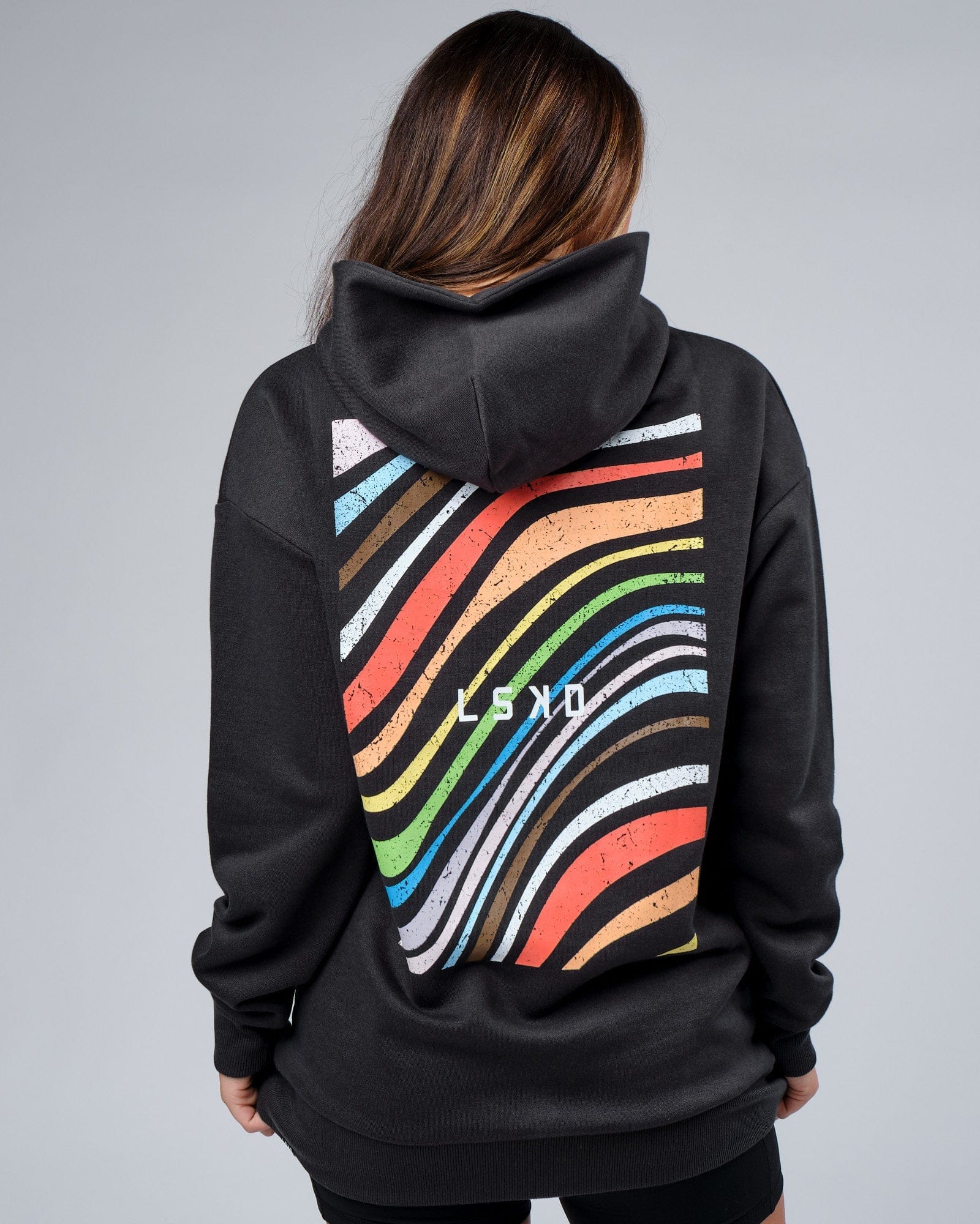 Model wearing Unisex Unity Hoodie Oversize - Pirate Black