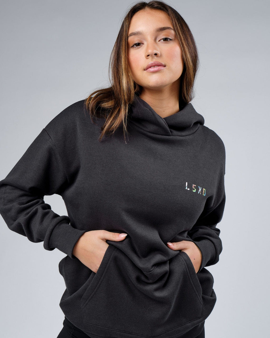 Model wearing Unisex Unity Hoodie Oversize - Pirate Black