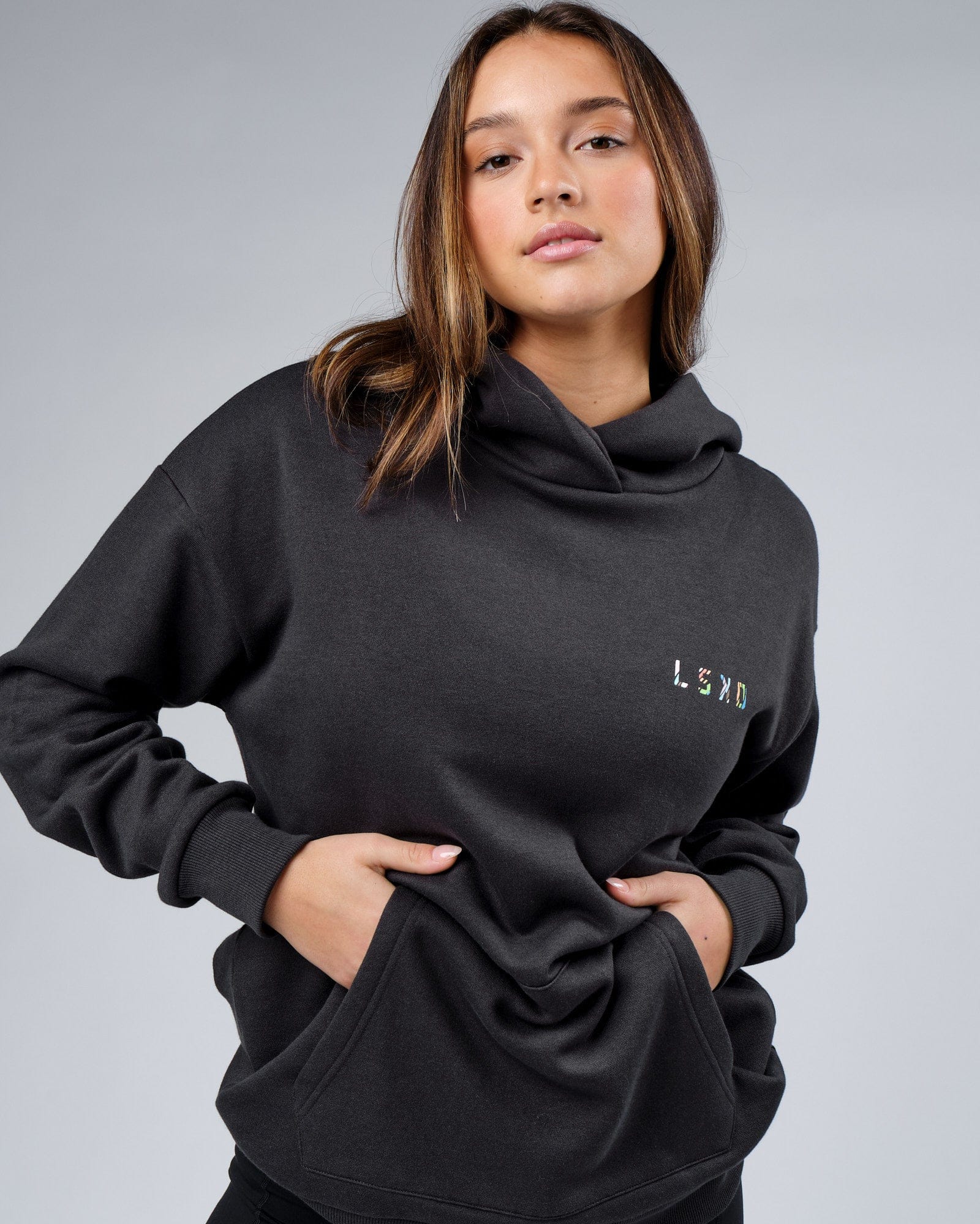 Model wearing Unisex Unity Hoodie Oversize - Pirate Black