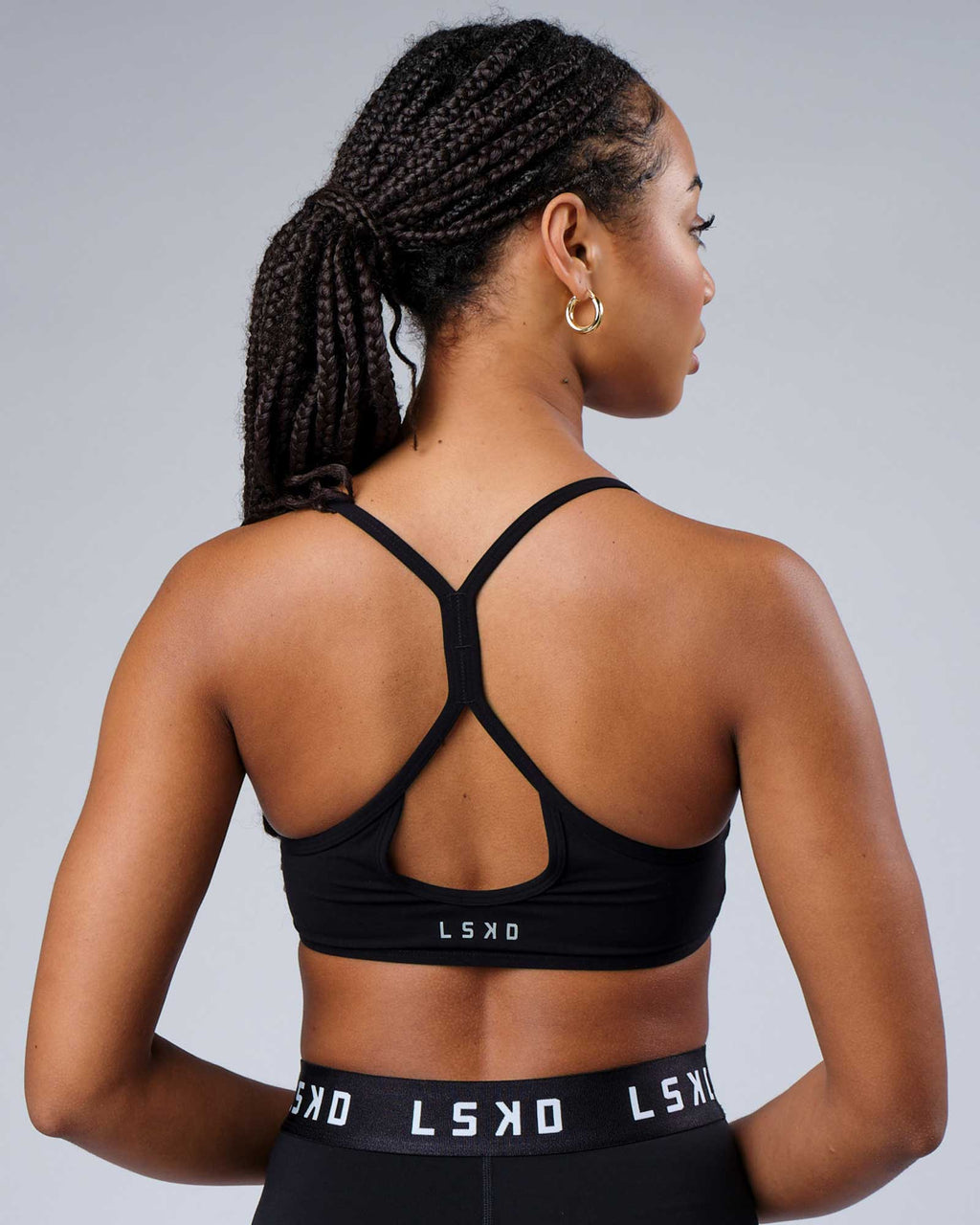 Model wearing Contour Sports Bra - Black