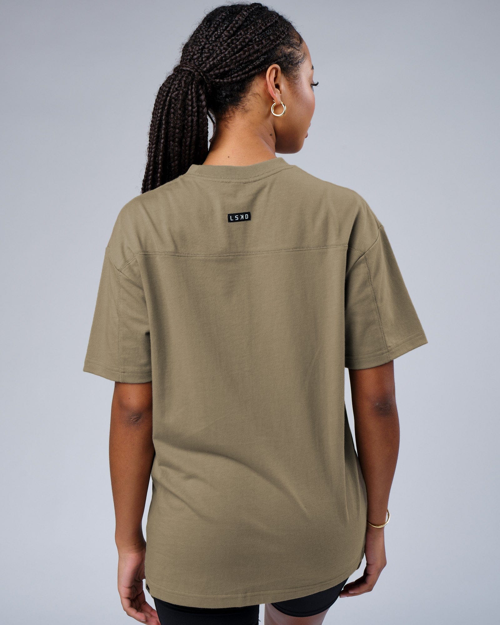 Model wearing Unisex Heavy Hitter Heavyweight Tee Oversize - Laurel Oak