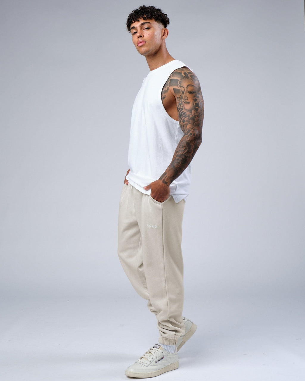 Model wearing Ready Track Pant - Bone