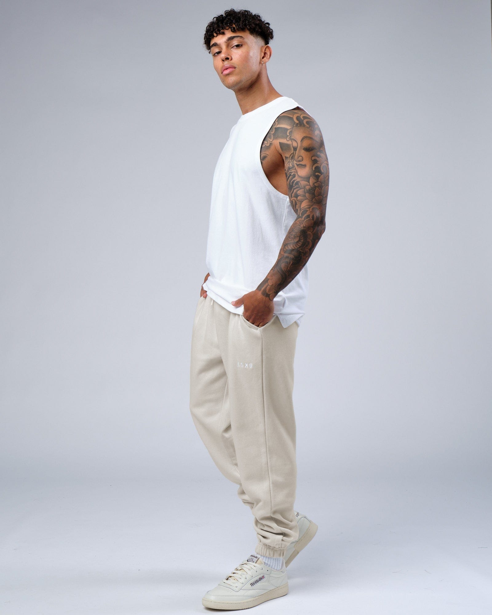 Model wearing Ready Track Pant - Bone