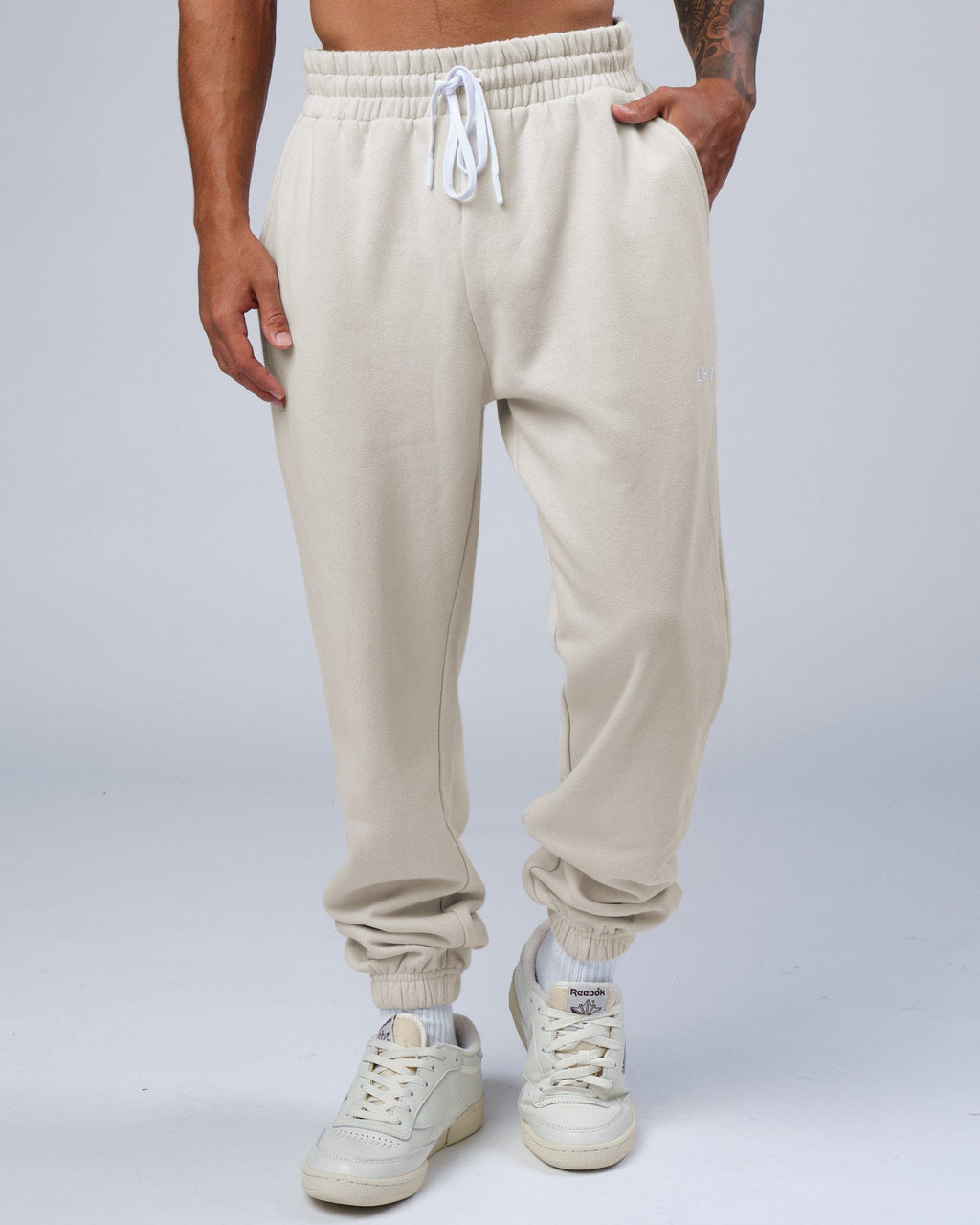 Model wearing Ready Track Pant - Bone