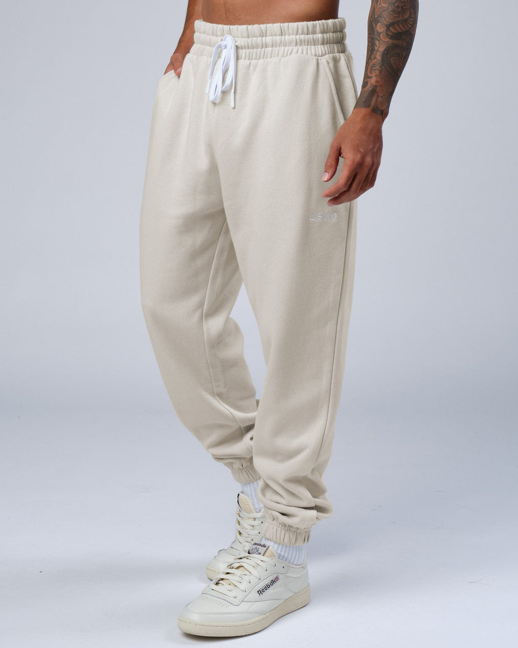 Model wearing Ready Track Pant - Bone