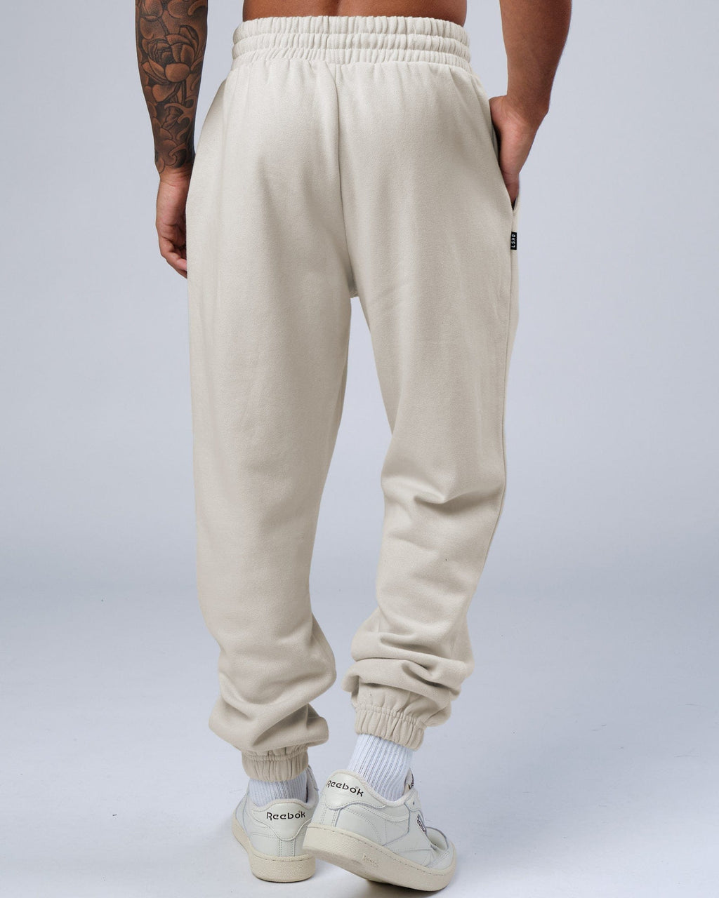 Model wearing Ready Track Pant - Bone