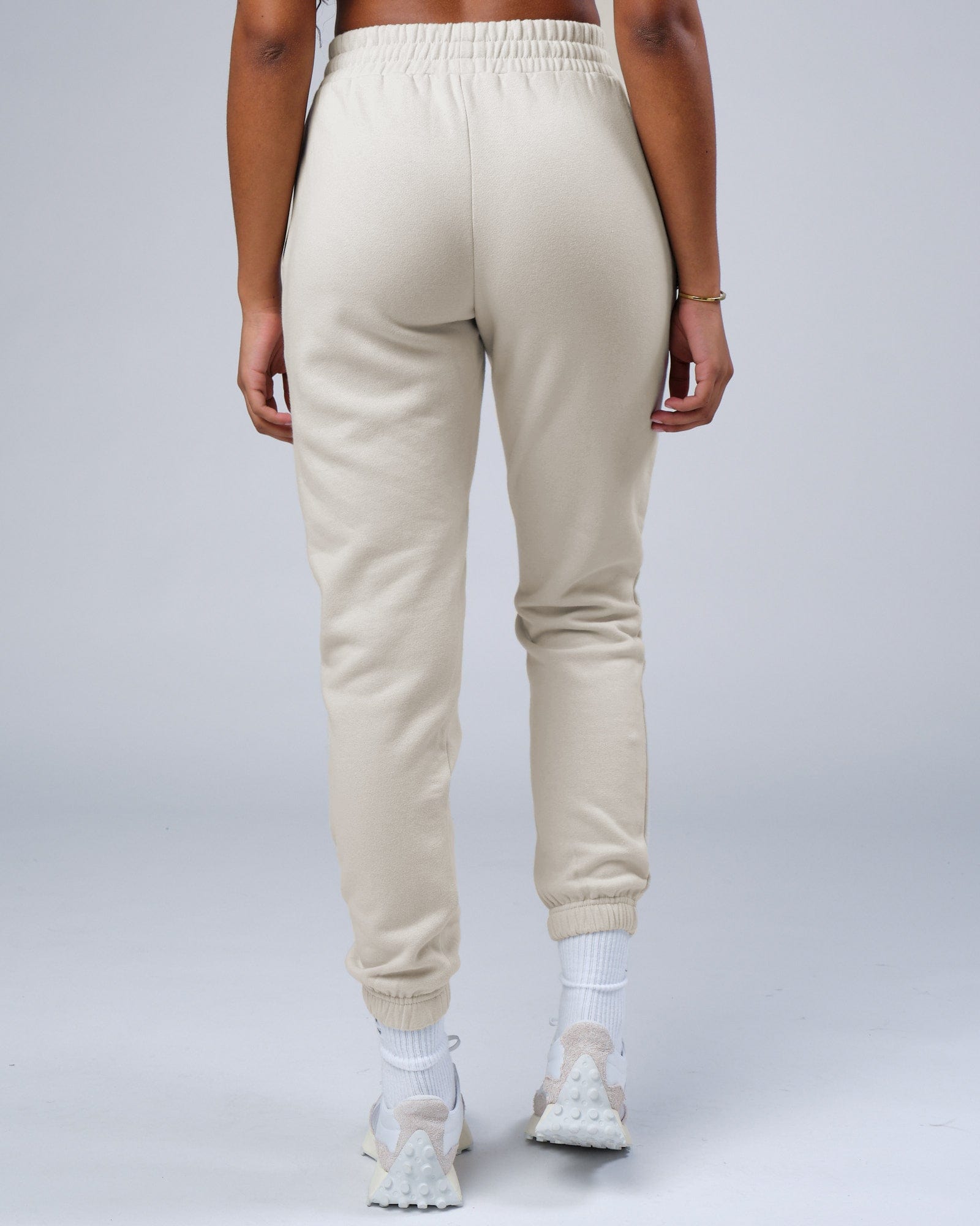 Model wearing Unisex Ready Track Pant - Bone