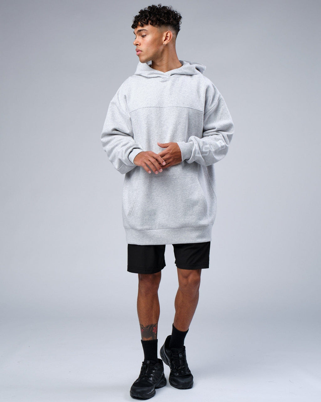 Model wearing Zone Hoodie Oversize - Lt Grey Marl