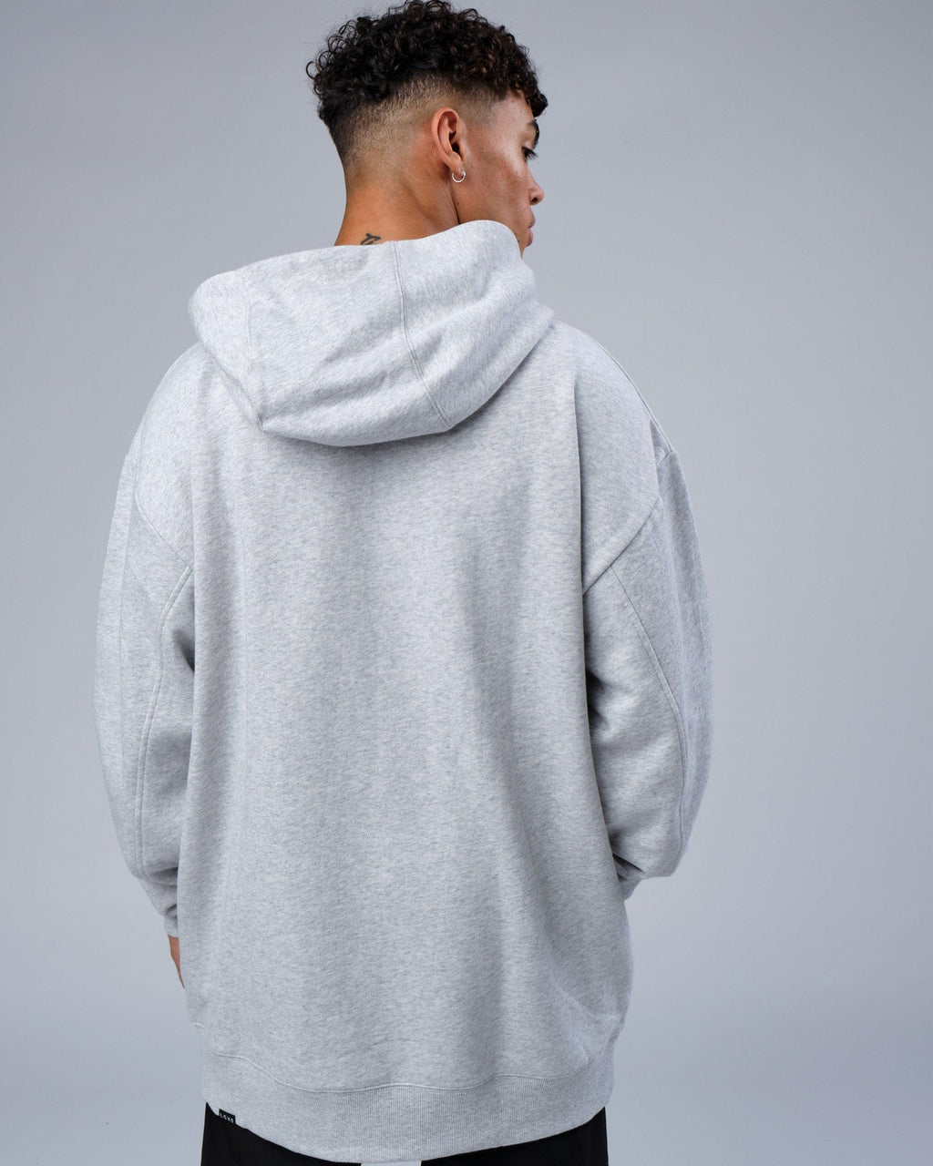 Model wearing Zone Hoodie Oversize - Lt Grey Marl