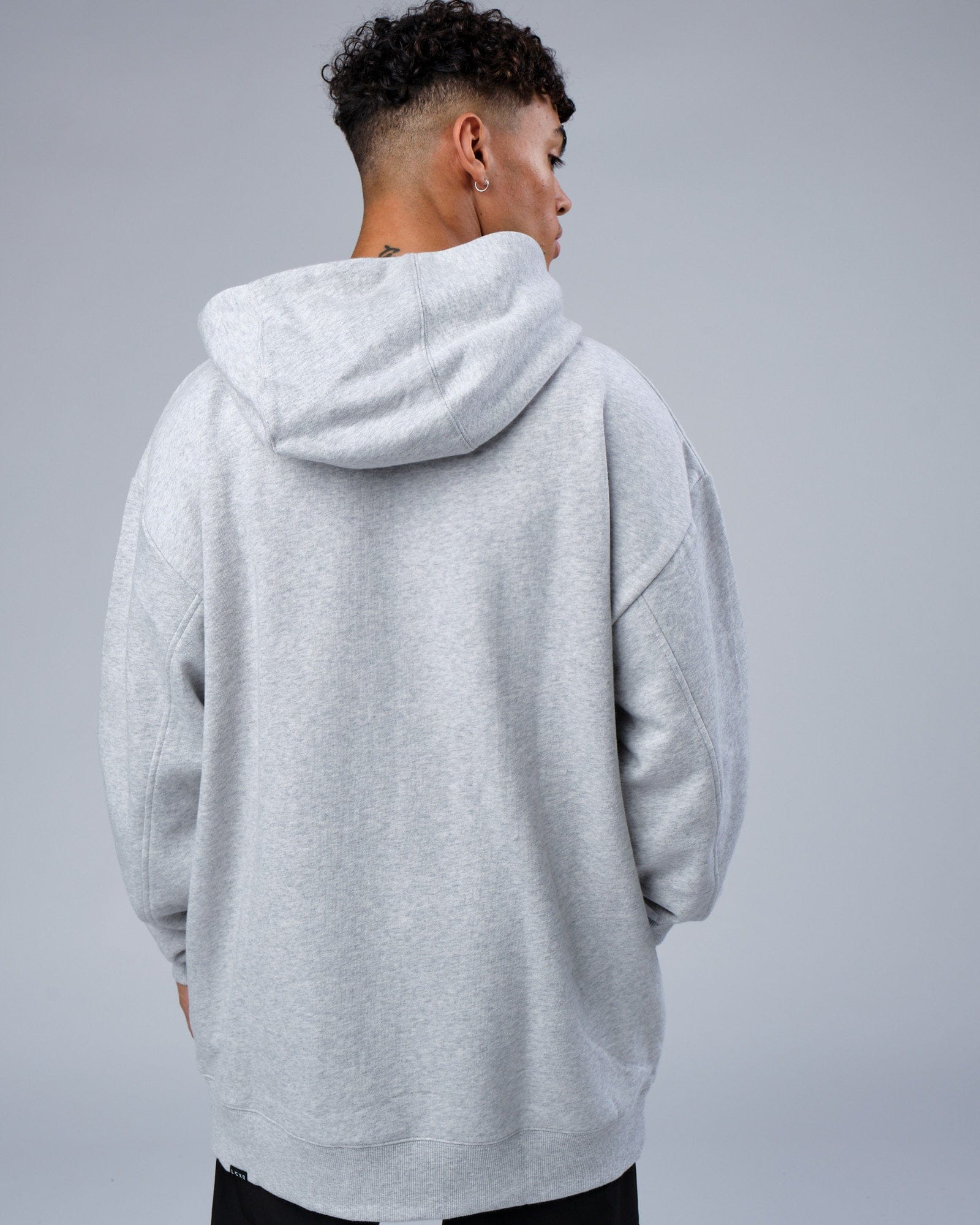 Model wearing Zone Hoodie Oversize - Lt Grey Marl