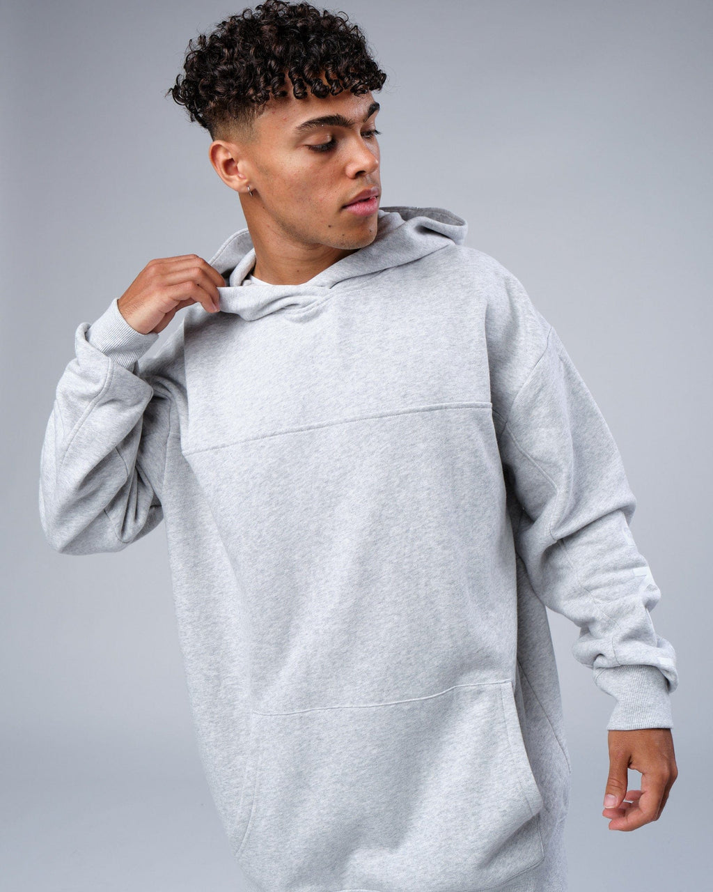 Model wearing Zone Hoodie Oversize - Lt Grey Marl