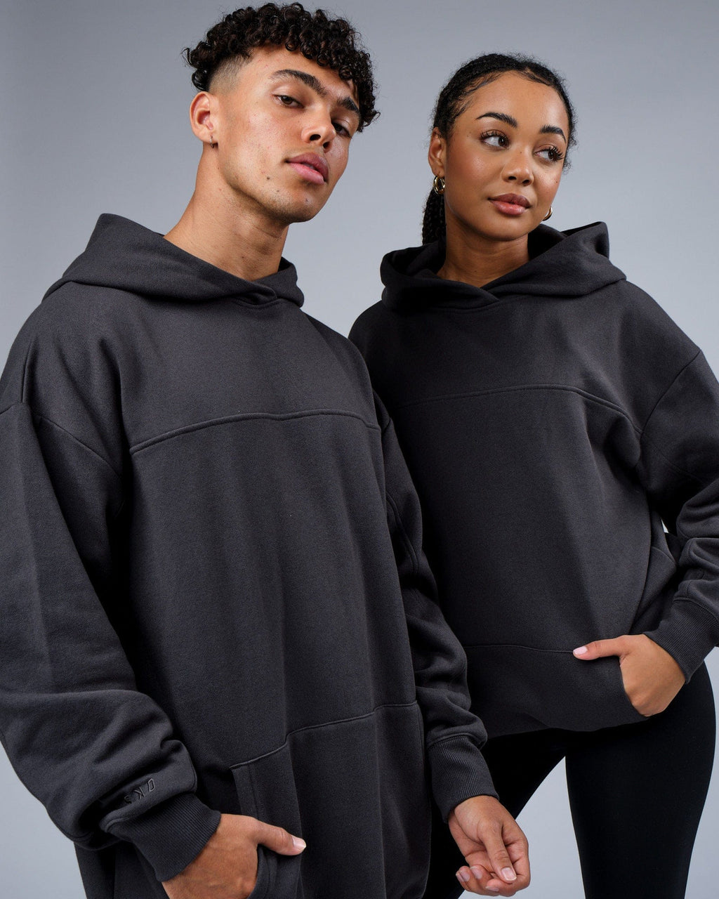 Model wearing Unisex Zone Hoodie Oversize - Phantom