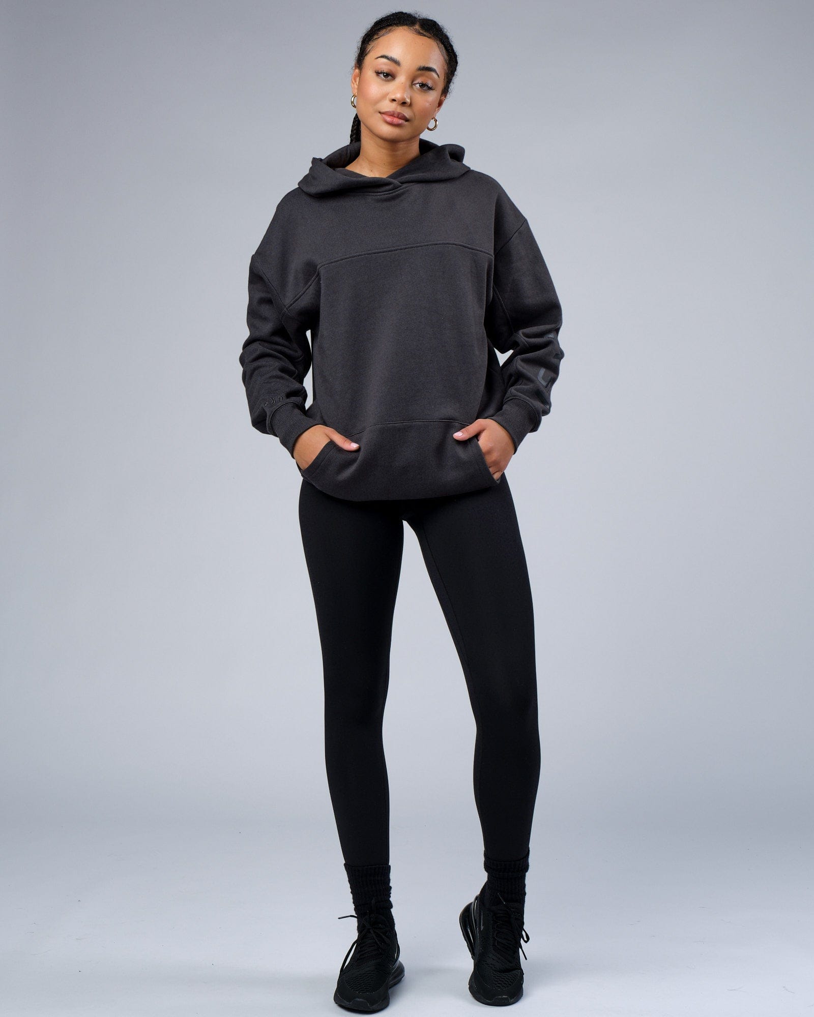 Model wearing Unisex Zone Hoodie Oversize - Phantom