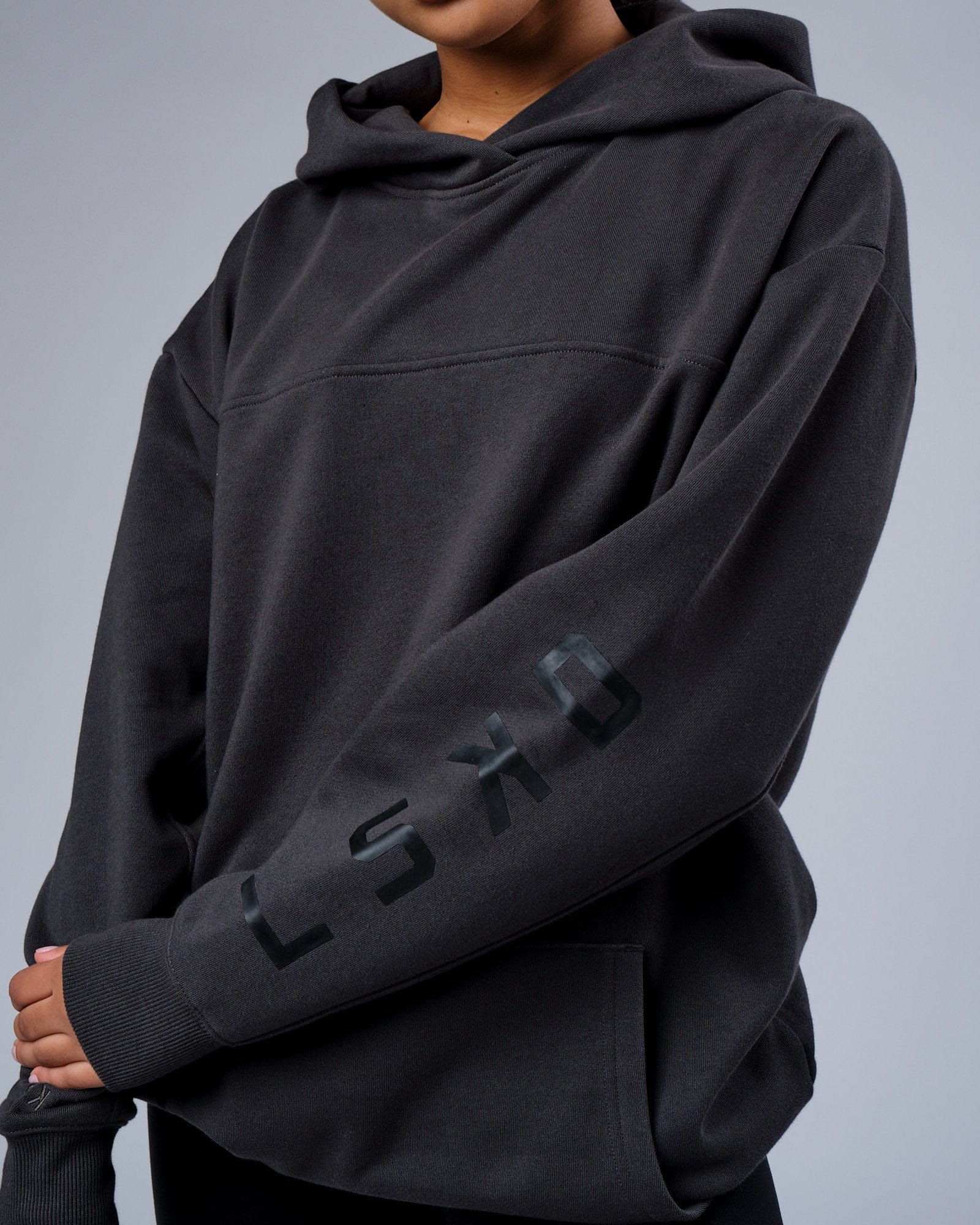 Model wearing Unisex Zone Hoodie Oversize - Phantom