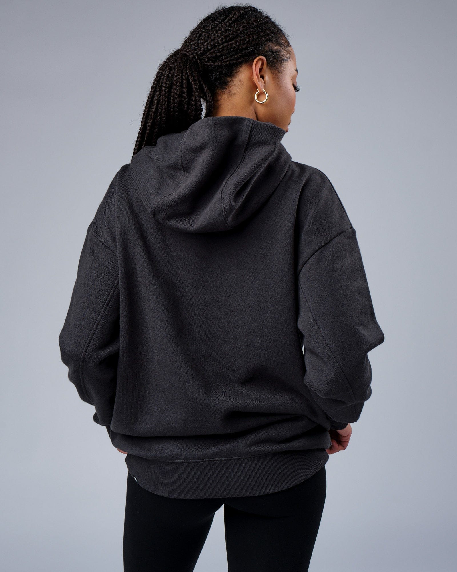 Model wearing Unisex Zone Hoodie Oversize - Phantom