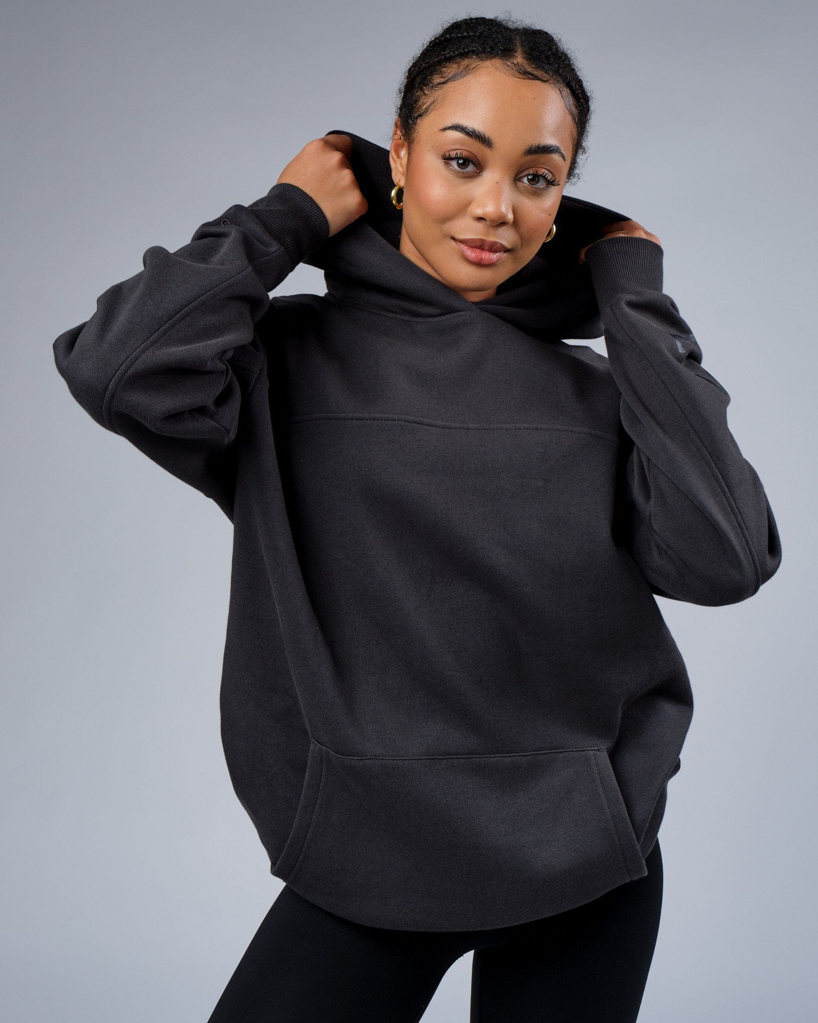 Model wearing Unisex Zone Hoodie Oversize - Phantom