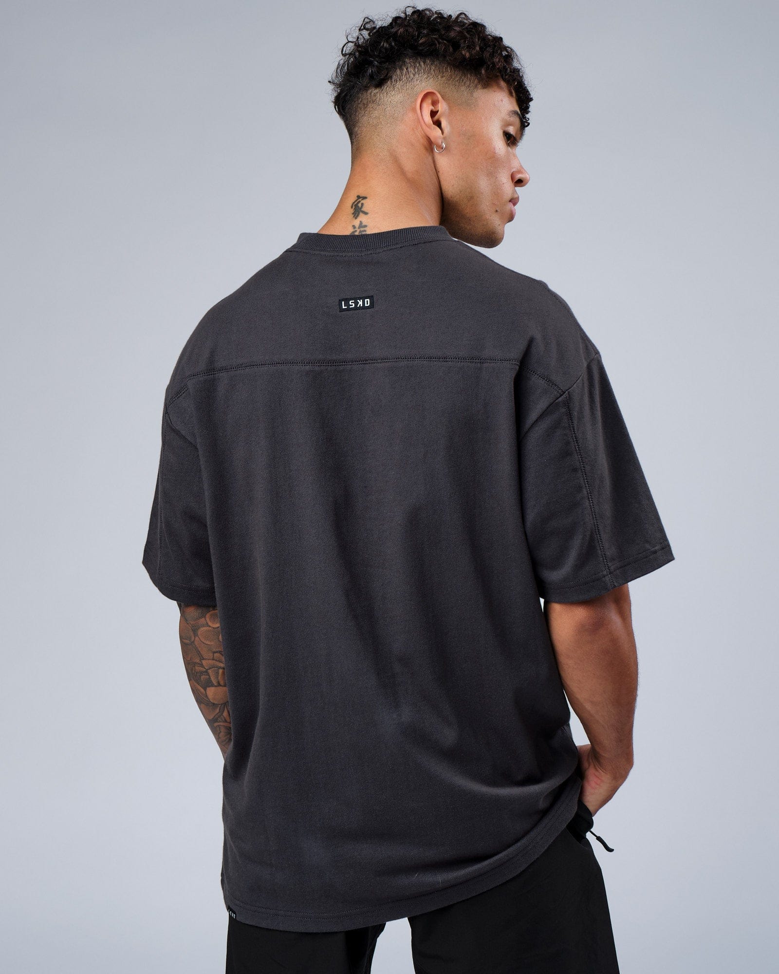 Model wearing Heavy Hitter Heavyweight Tee Oversize - Phantom